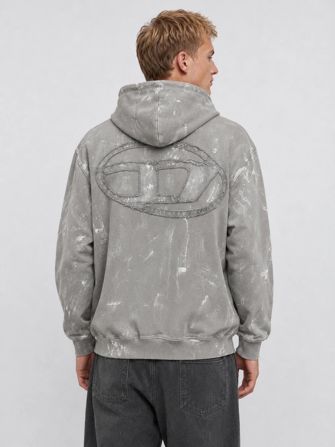 Back view with oversized tonal embroidered logo