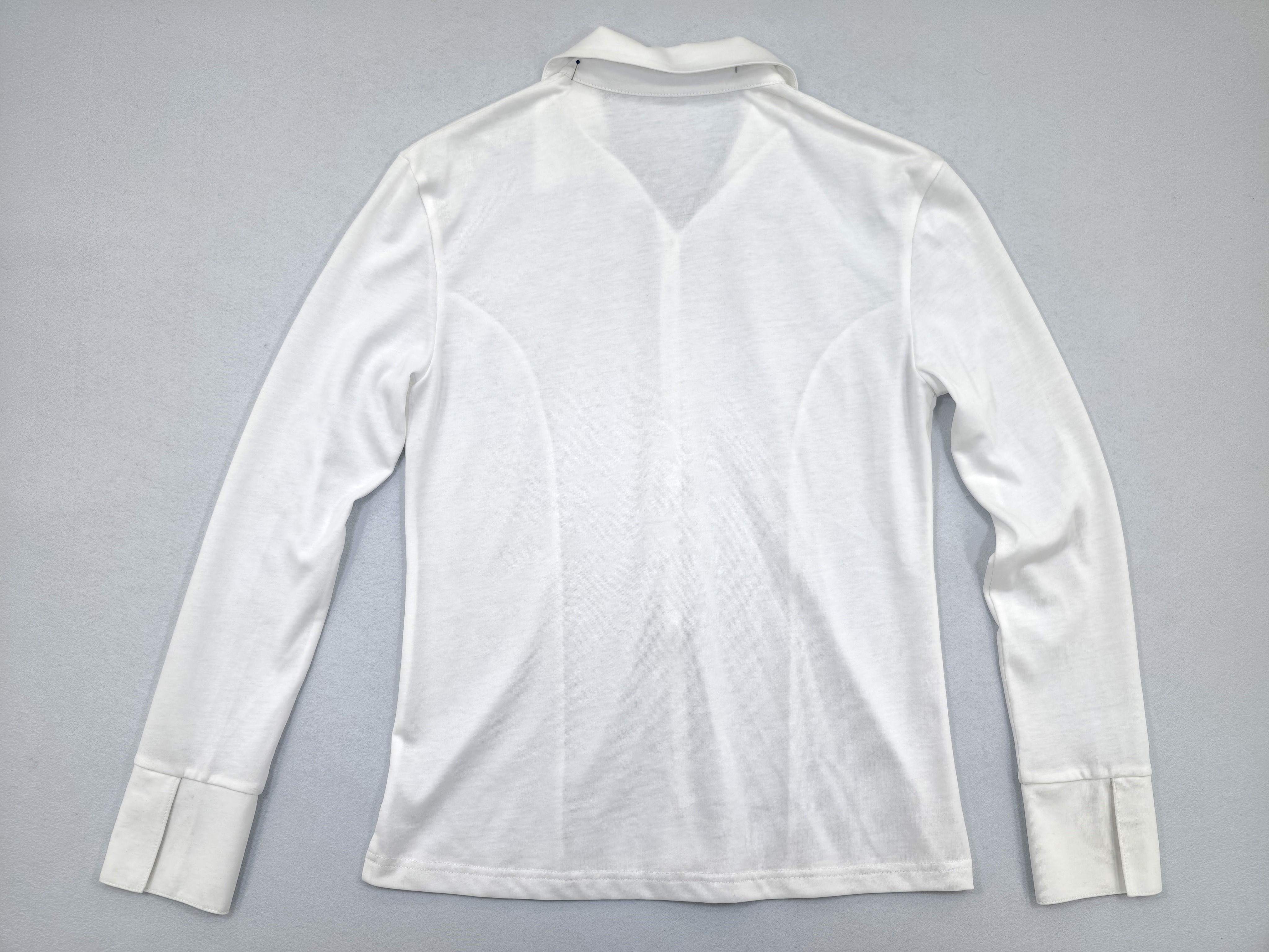Back view showing fitted panels and soft drape