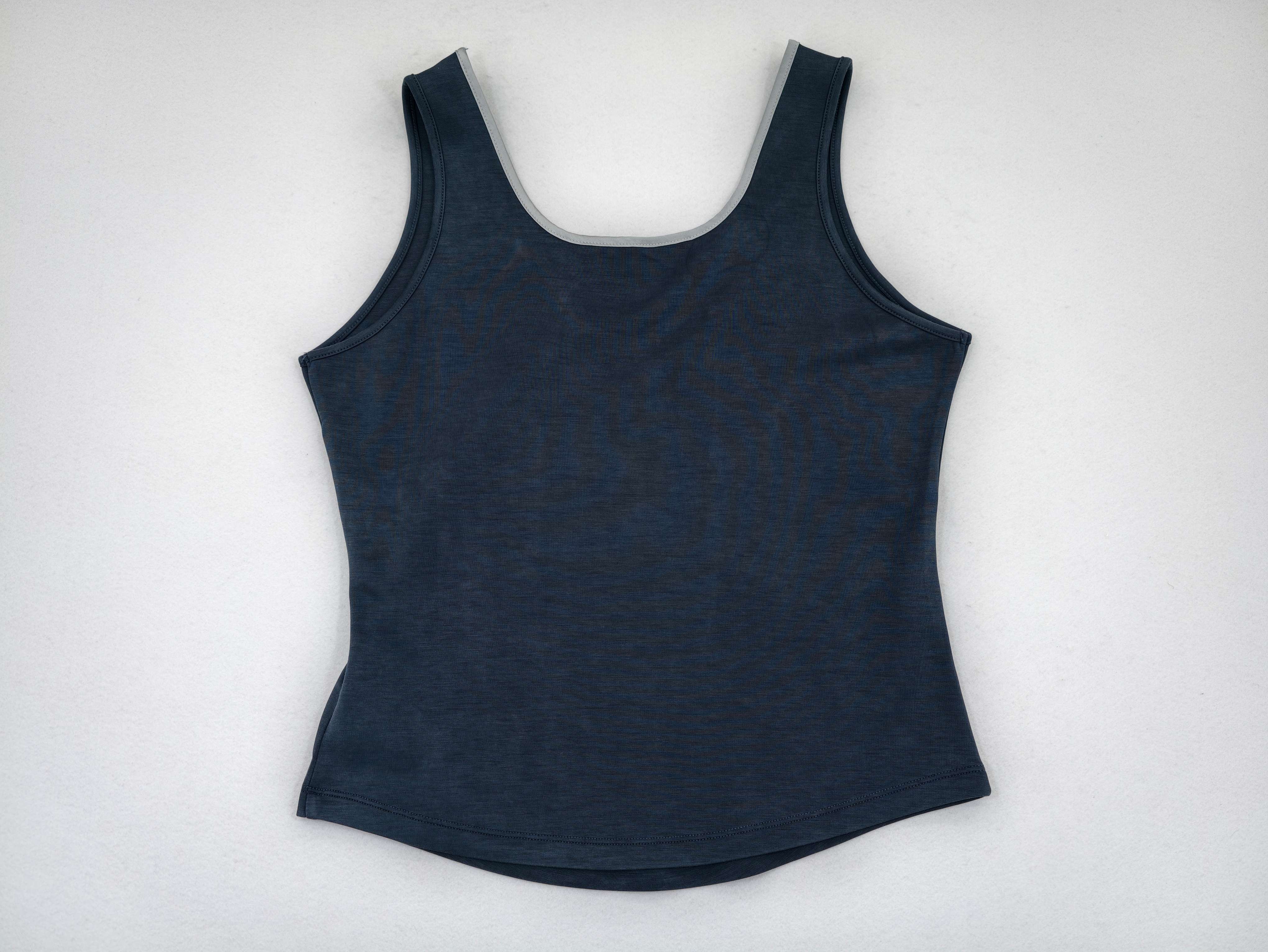 Back view with wide straps and curved lower hem