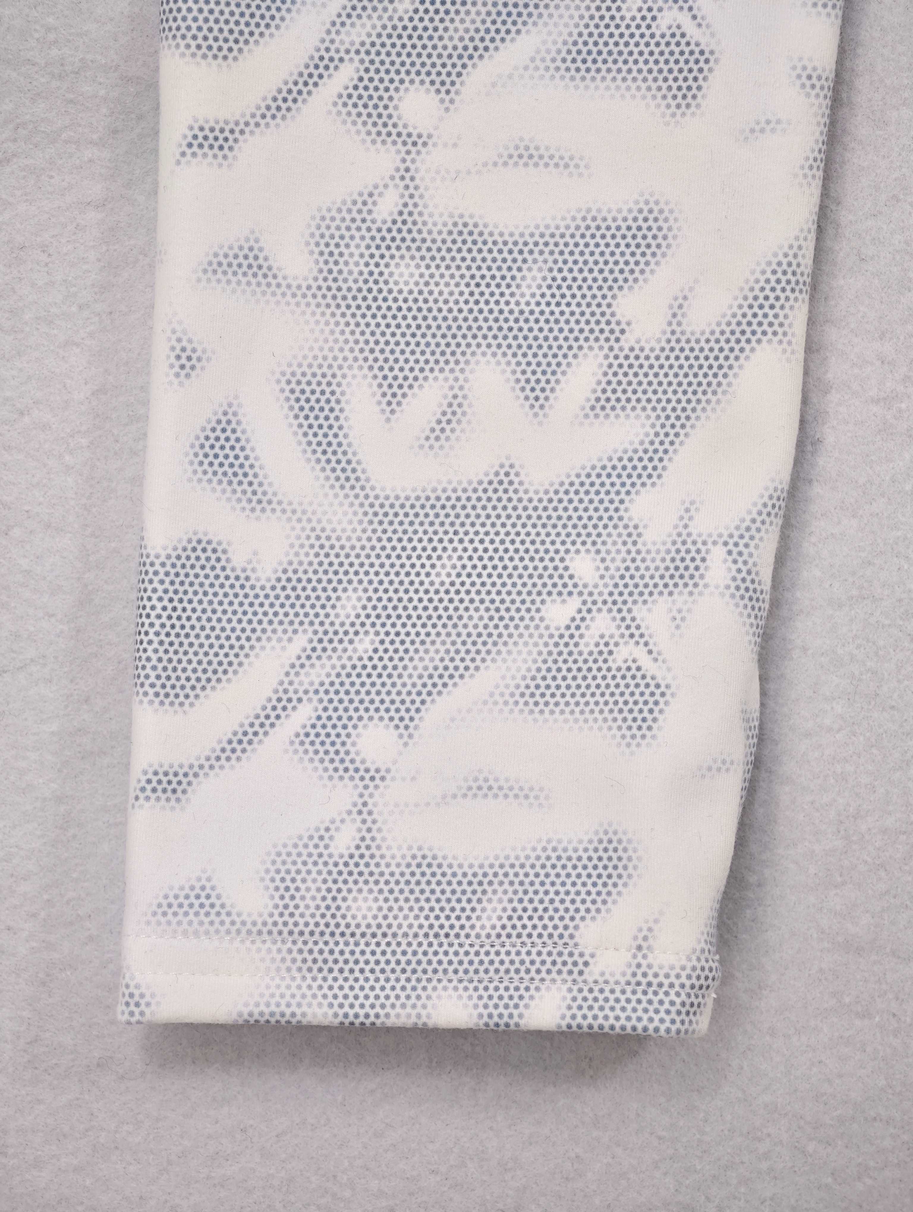 Printed long-sleeve cuff with clean folded hem