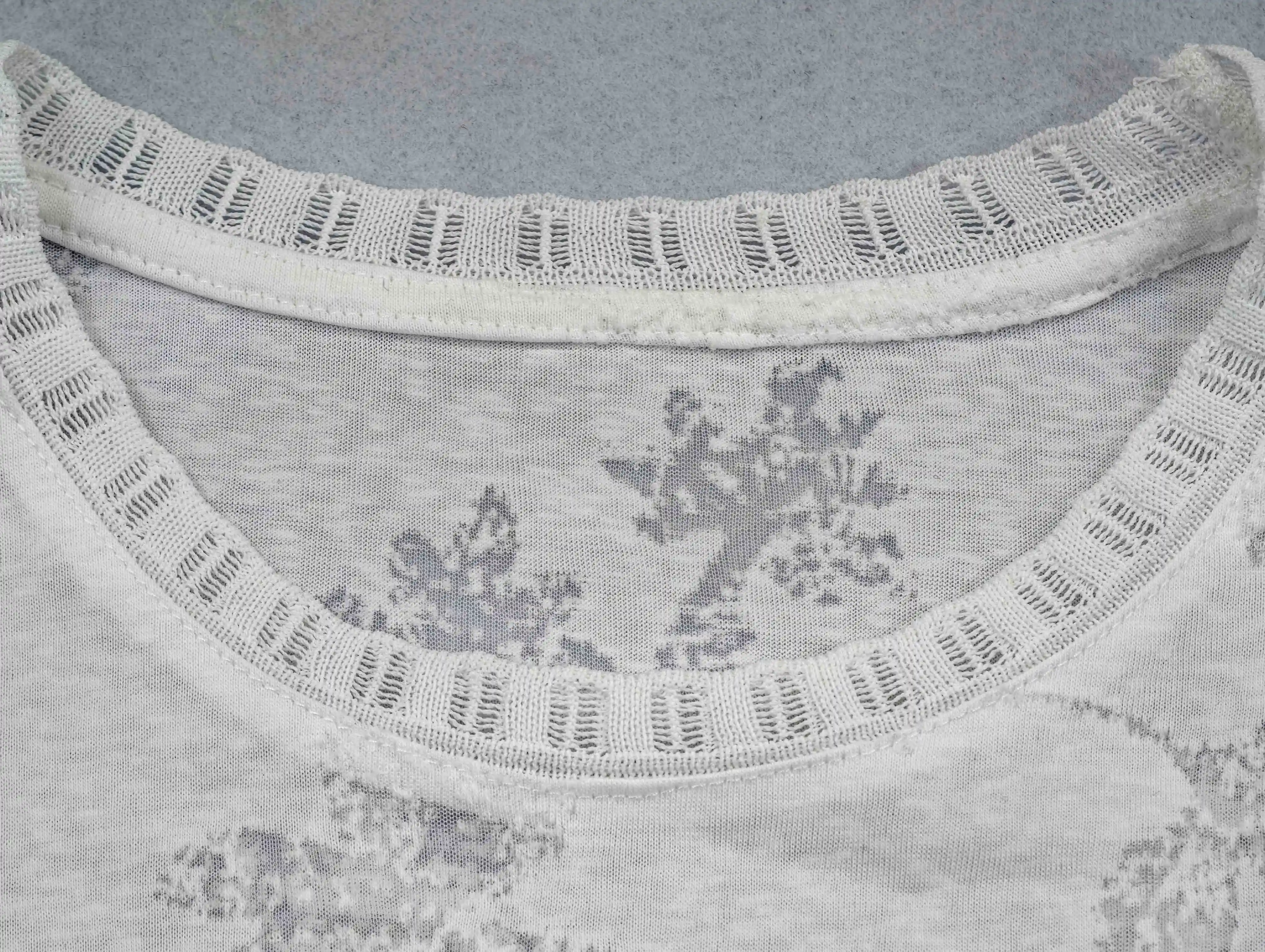 Openwork neckline trim on cotton-blend jersey