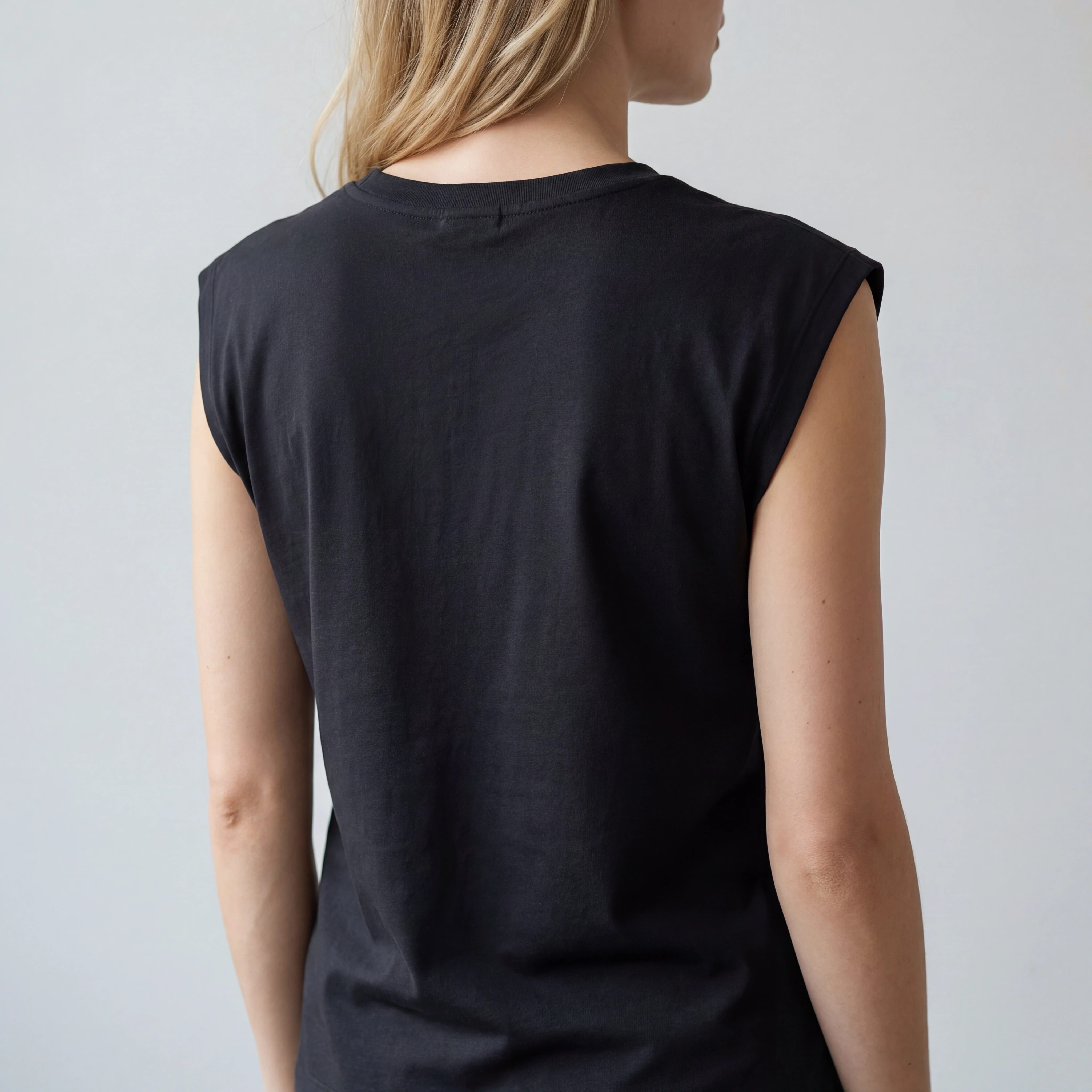 Back view of relaxed cotton-blend cap-sleeve casual top