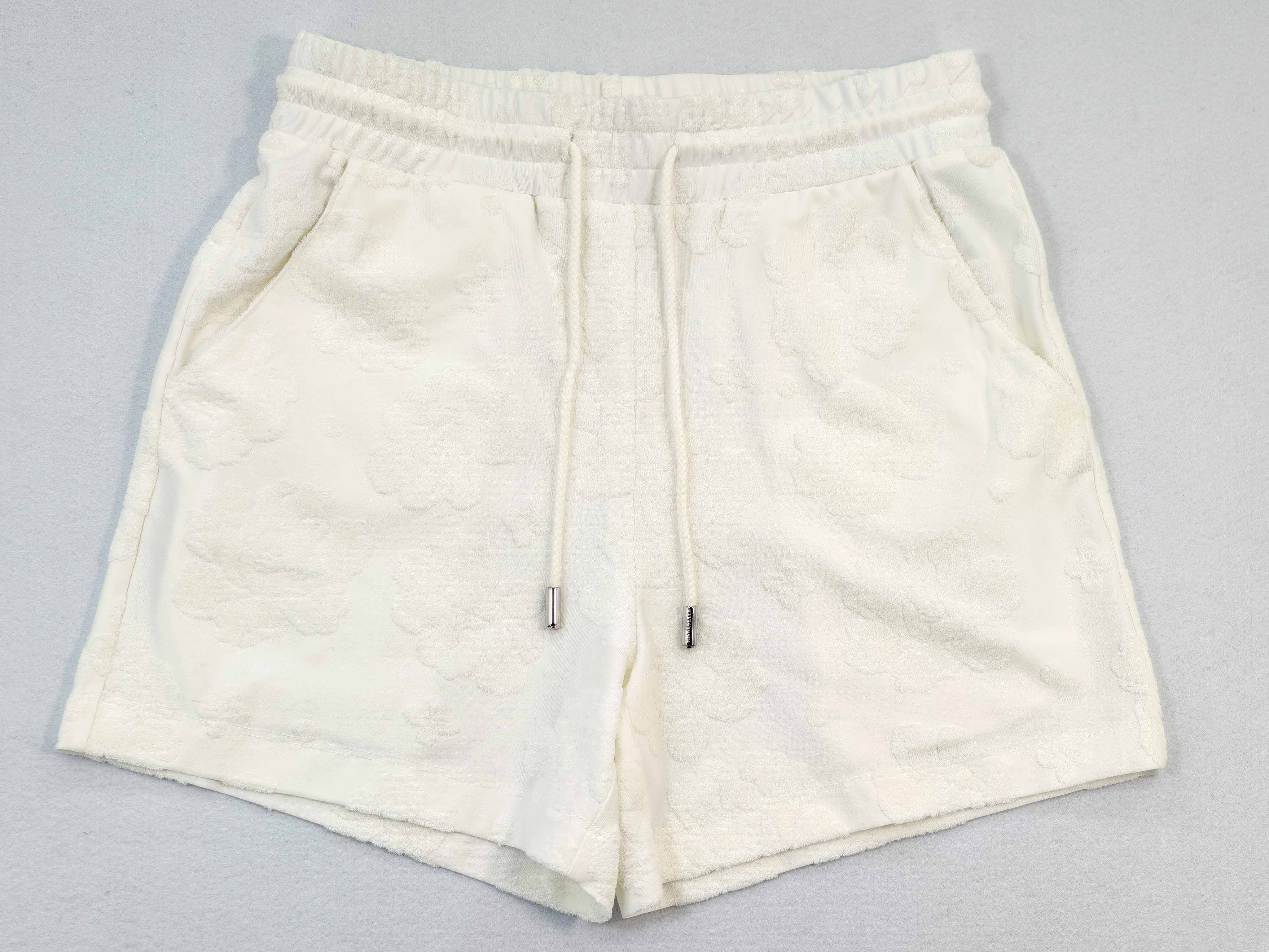 Back view with elastic waist and twin patch pockets