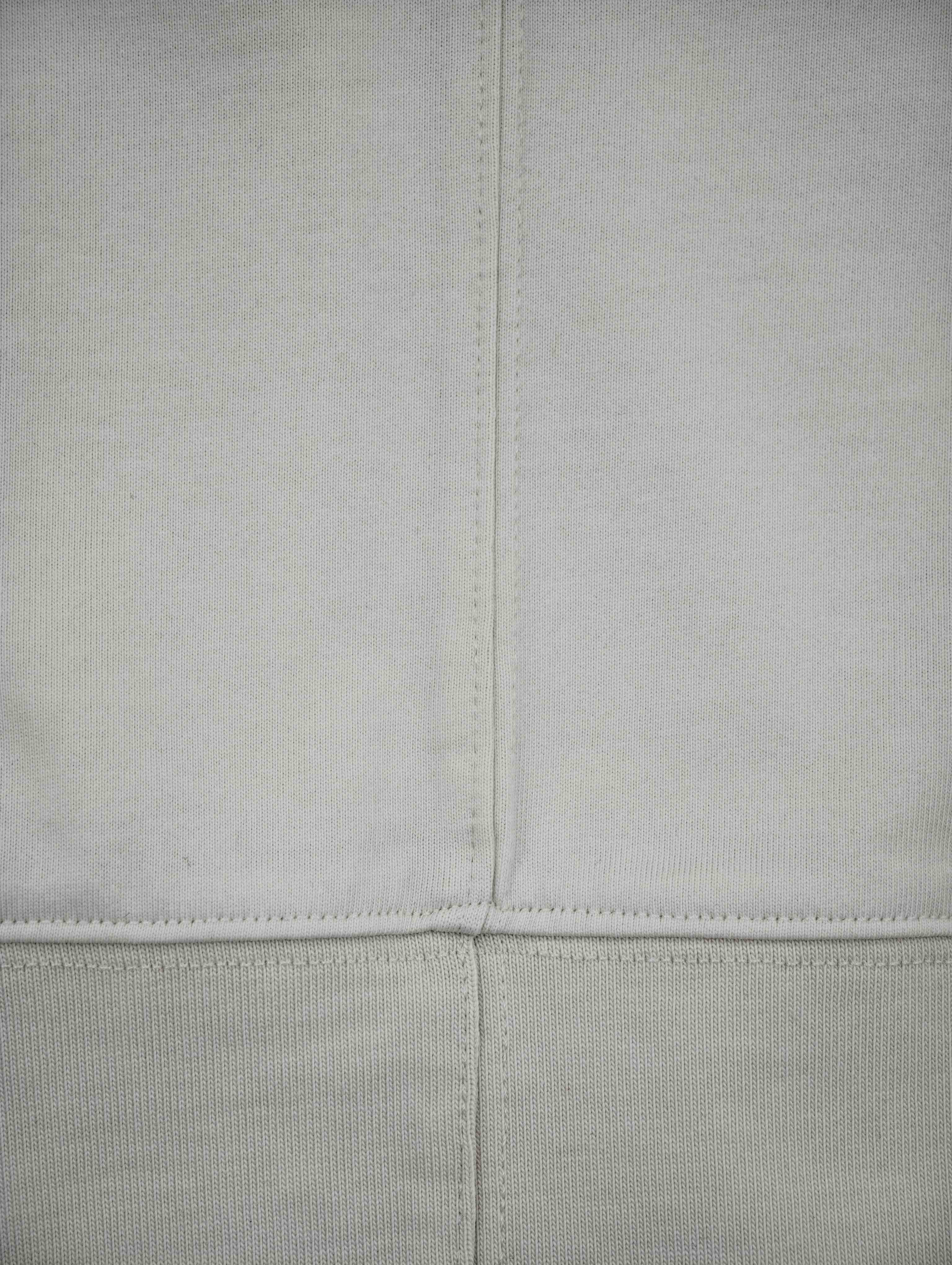 Dual-fabric center seam with clean horizontal panel join