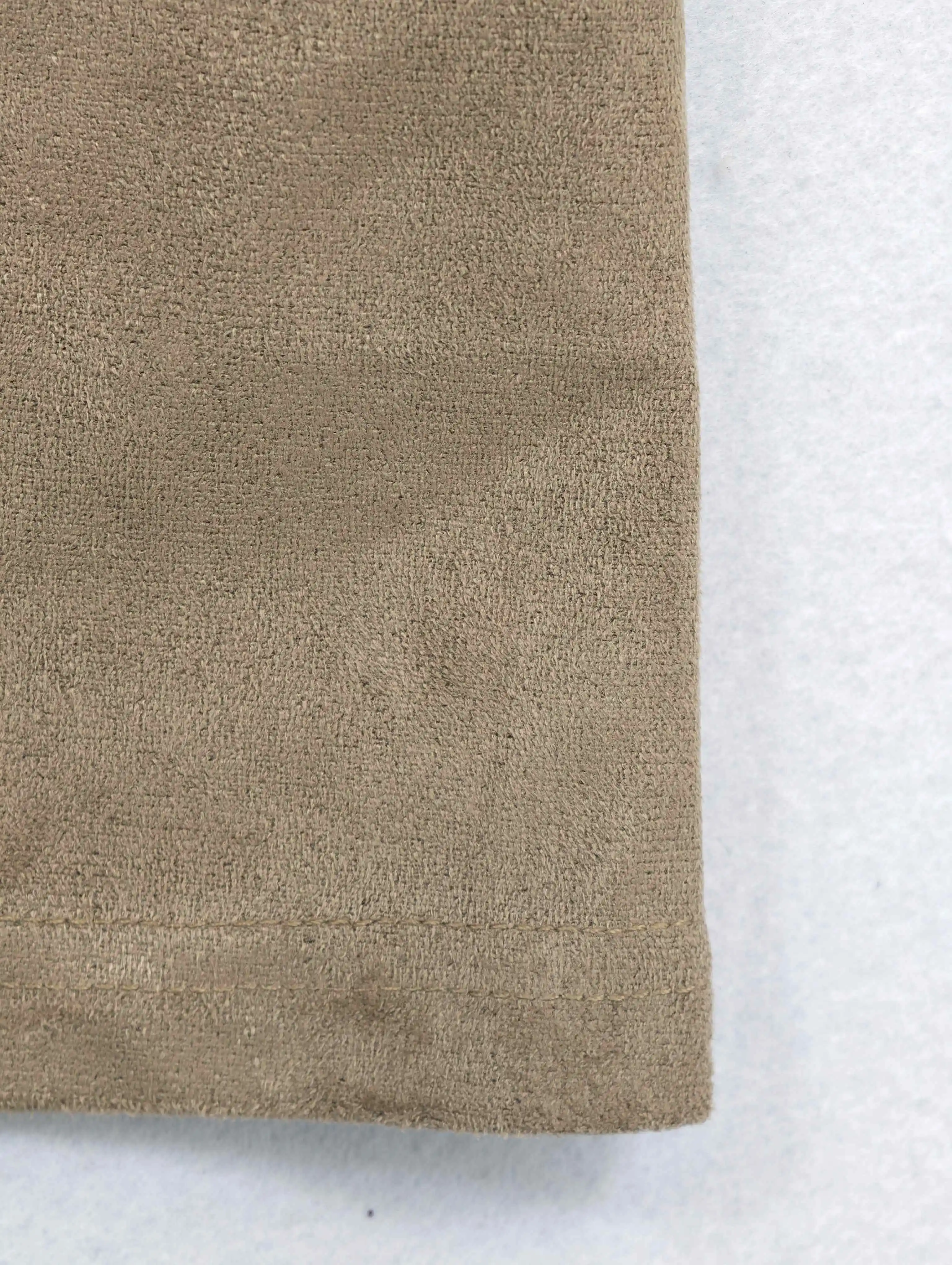 Suede-touch surface and clean maxi skirt hem