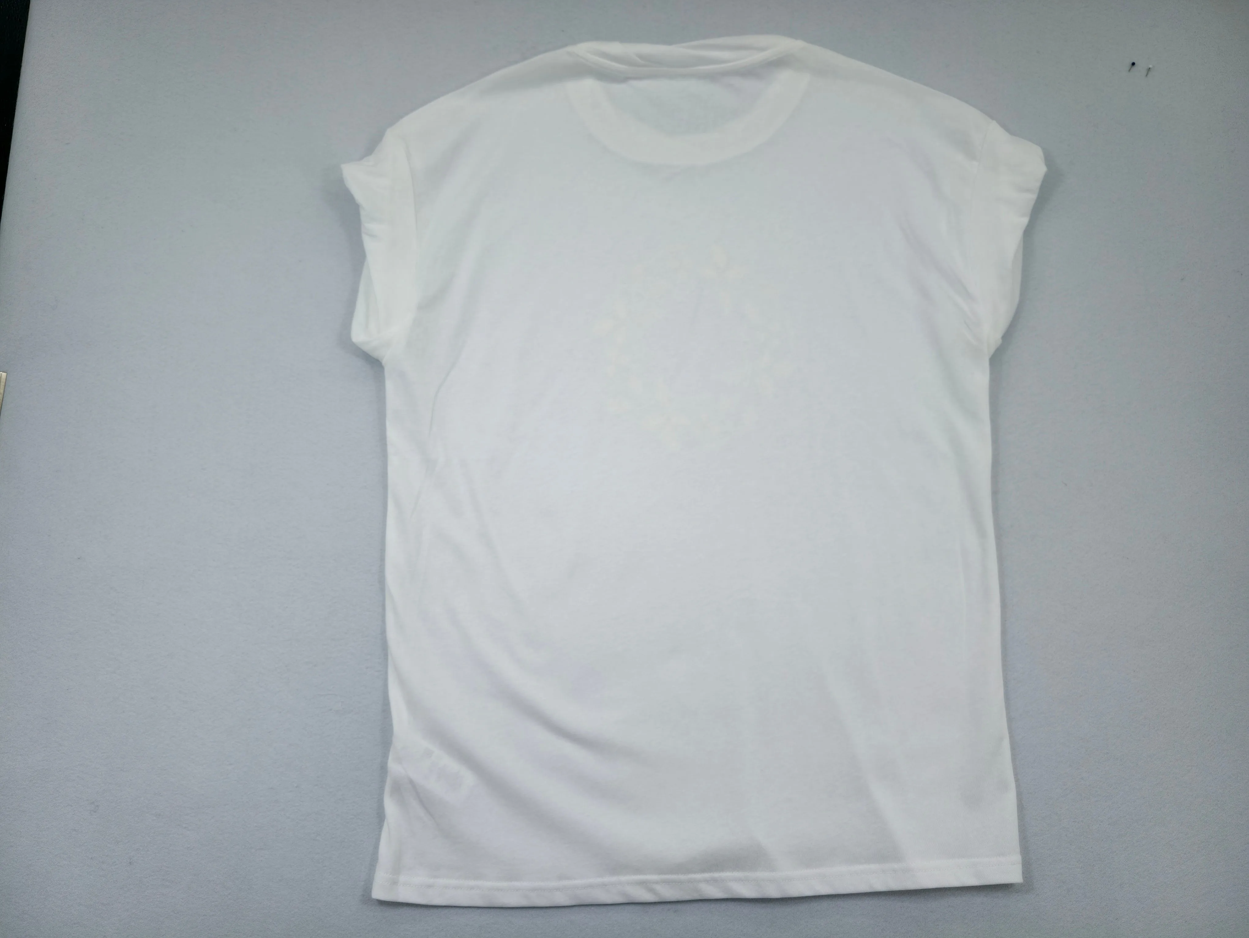 Back view of relaxed white rolled-sleeve T-shirt