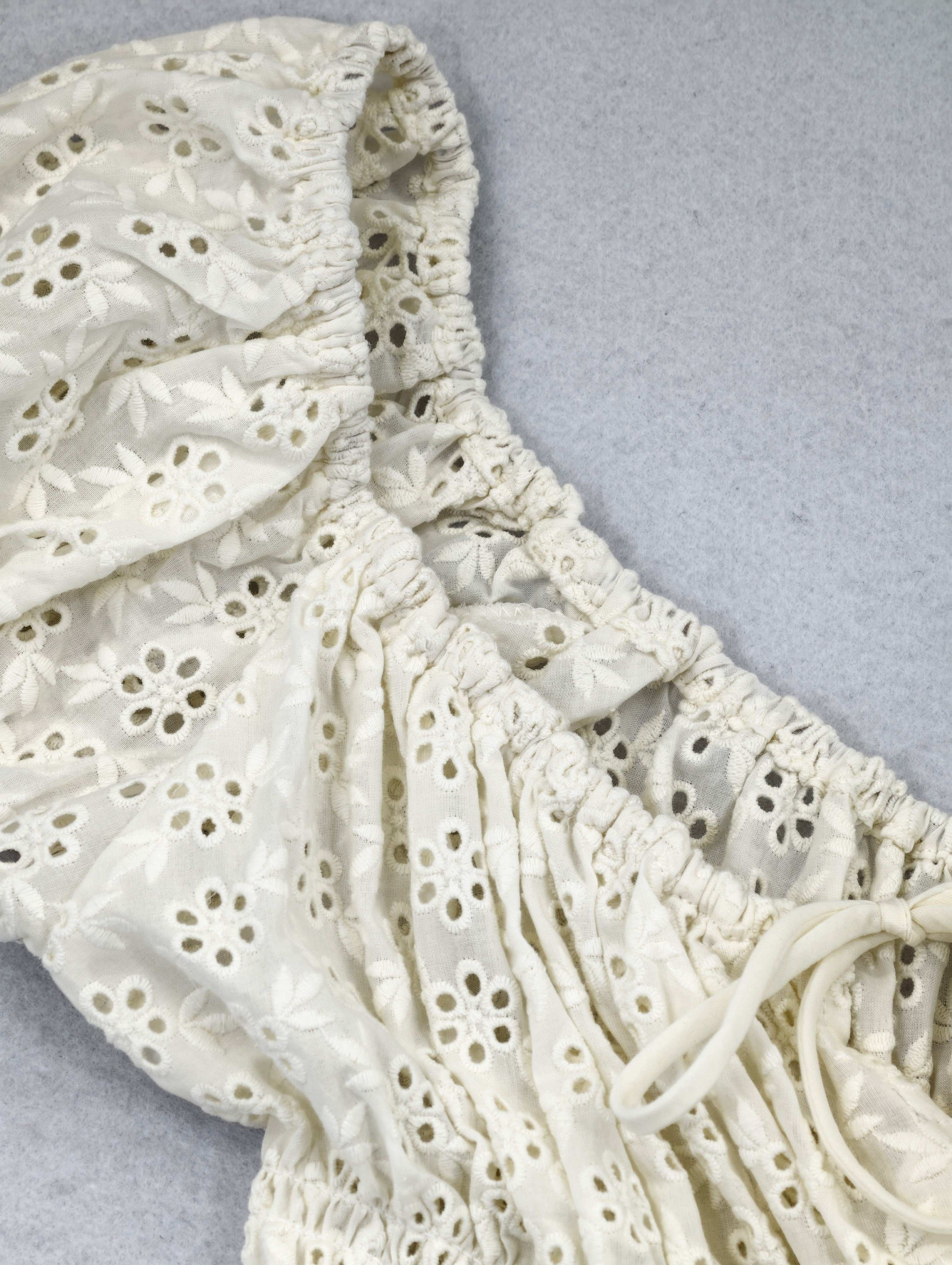 Elastic off-shoulder neckline with drawcord detail