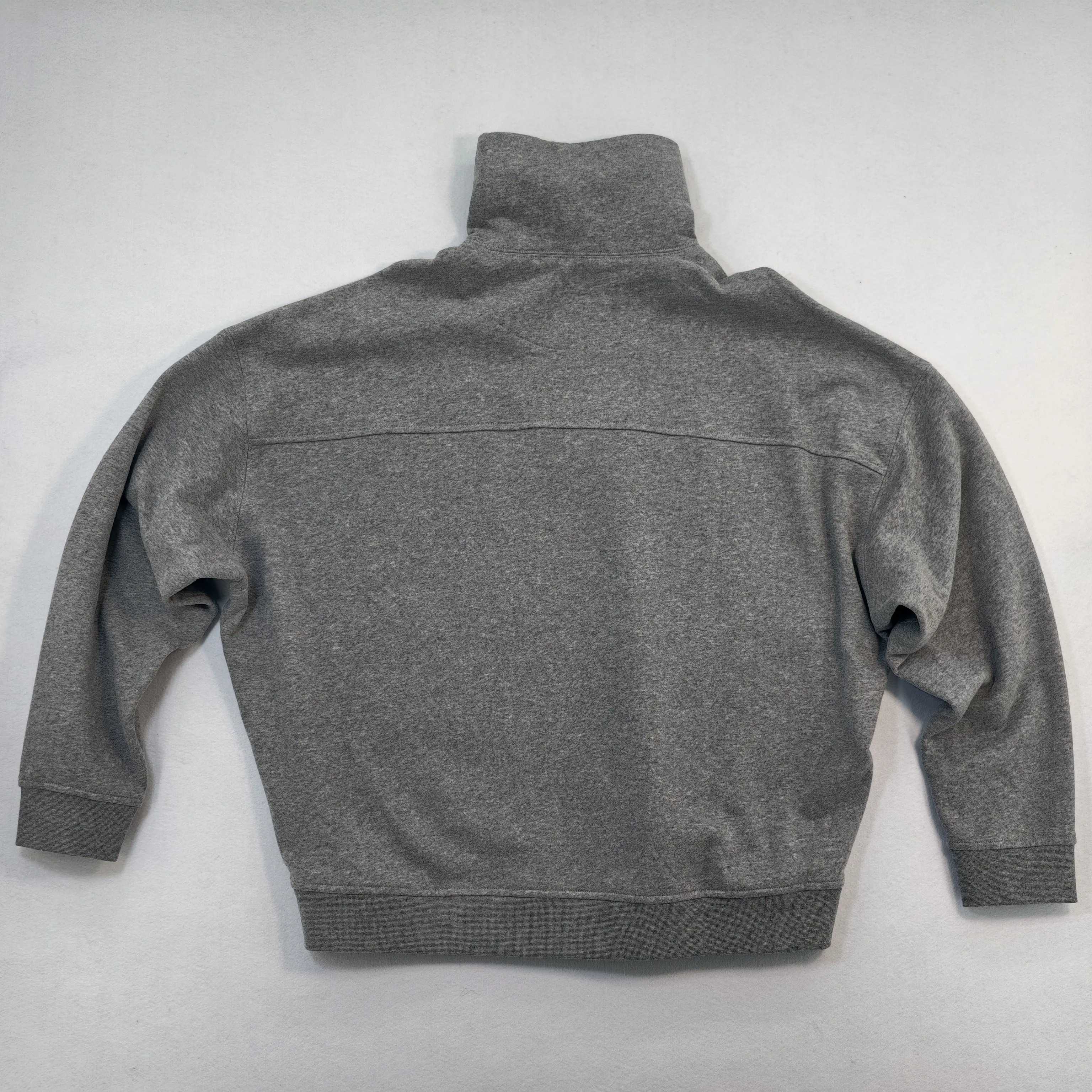 Back flat view with relaxed shoulders and straight hem