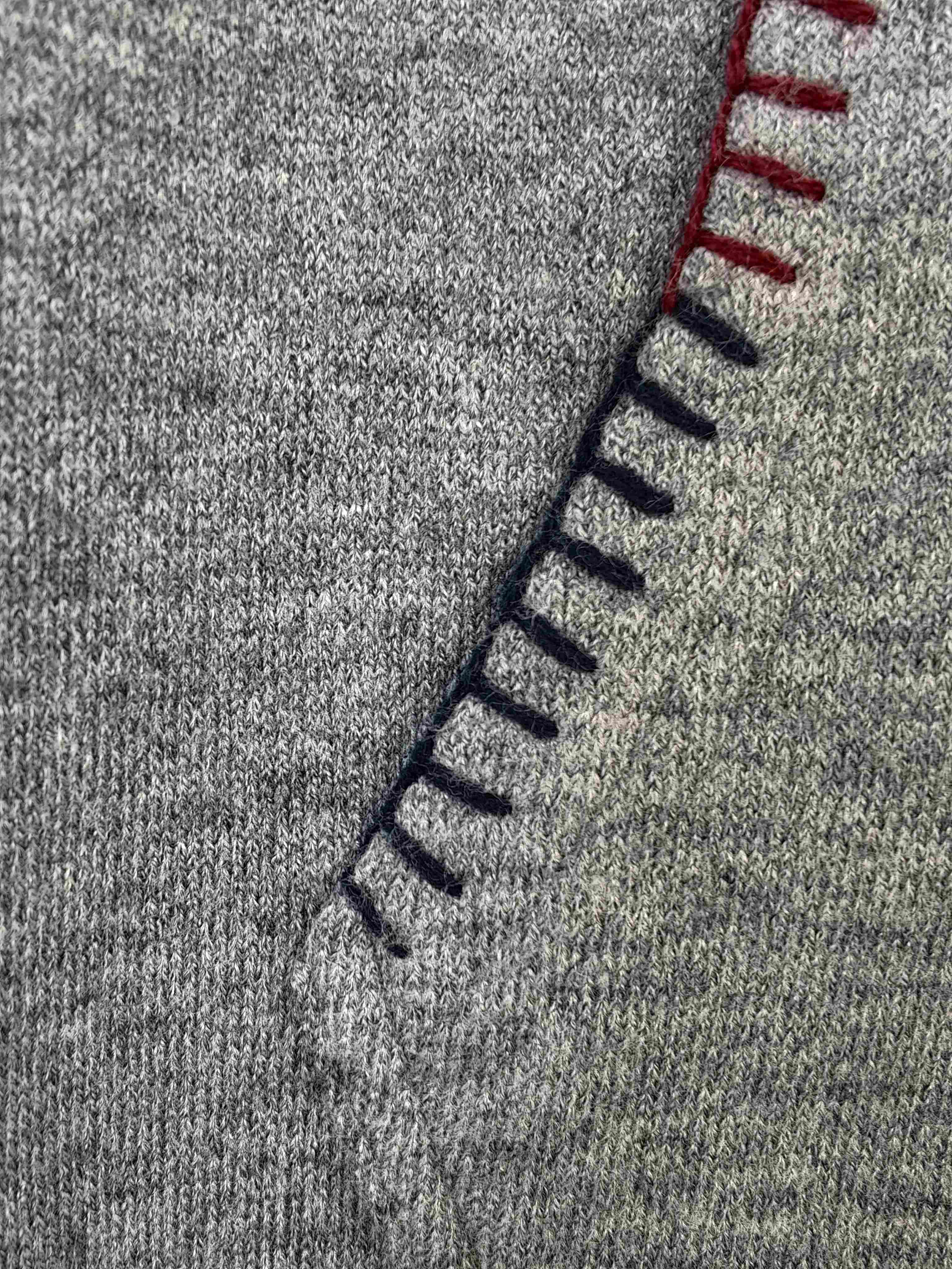 Contrast blanket stitching on custom front pocket detail