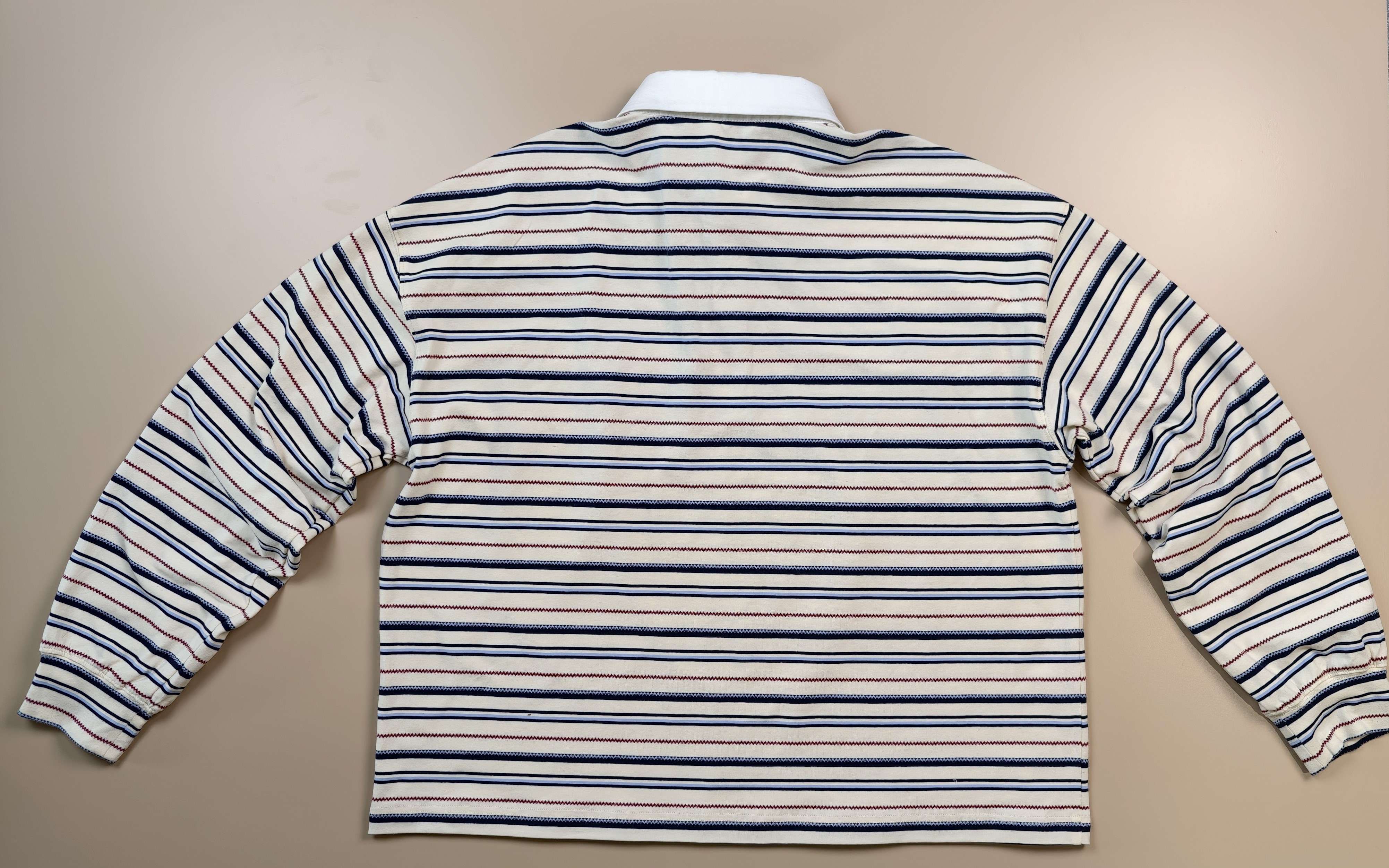 Back flat view showing stripe alignment across shoulder seams