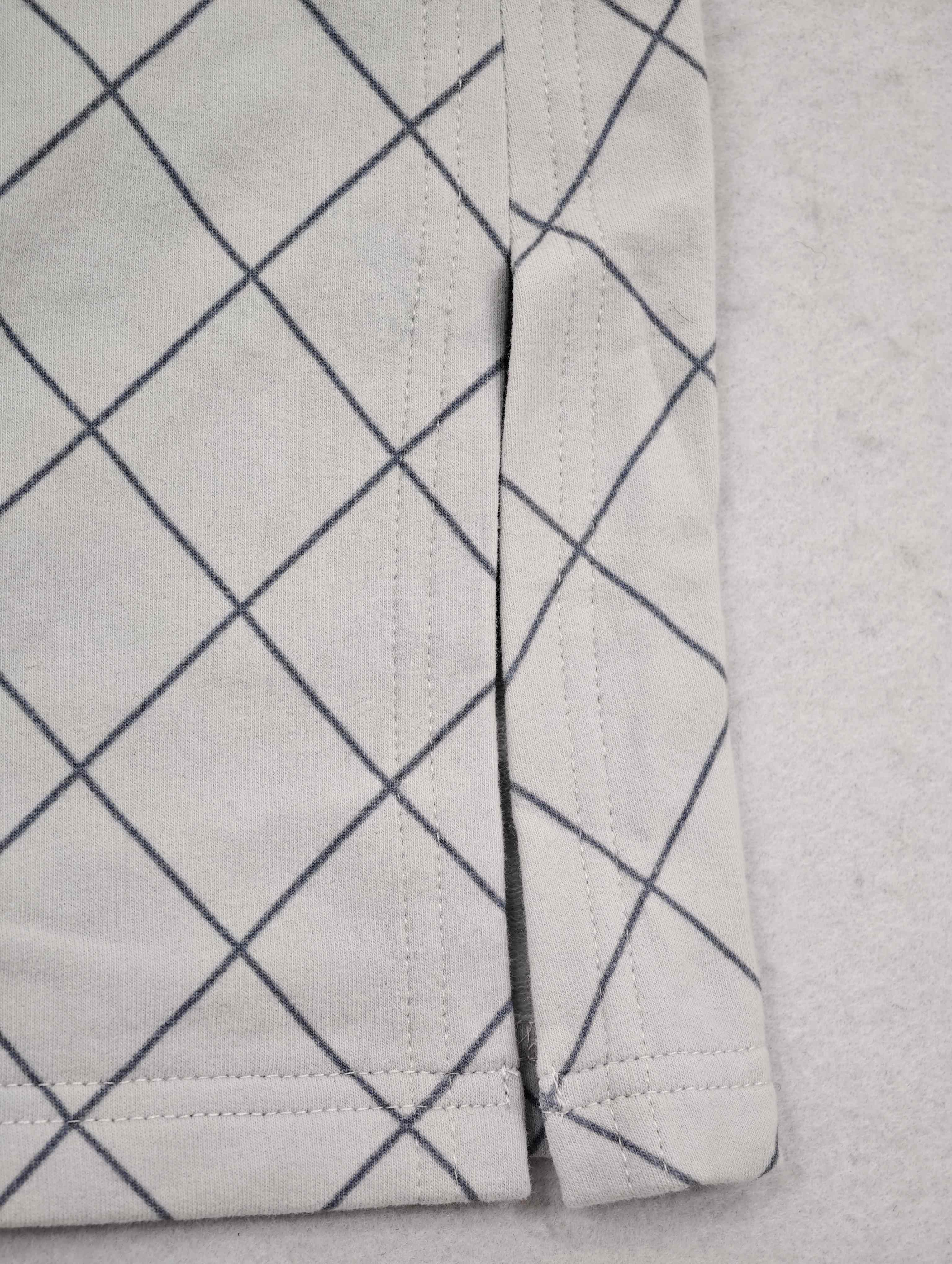 Side slit detail on cotton-stretch knit skirt