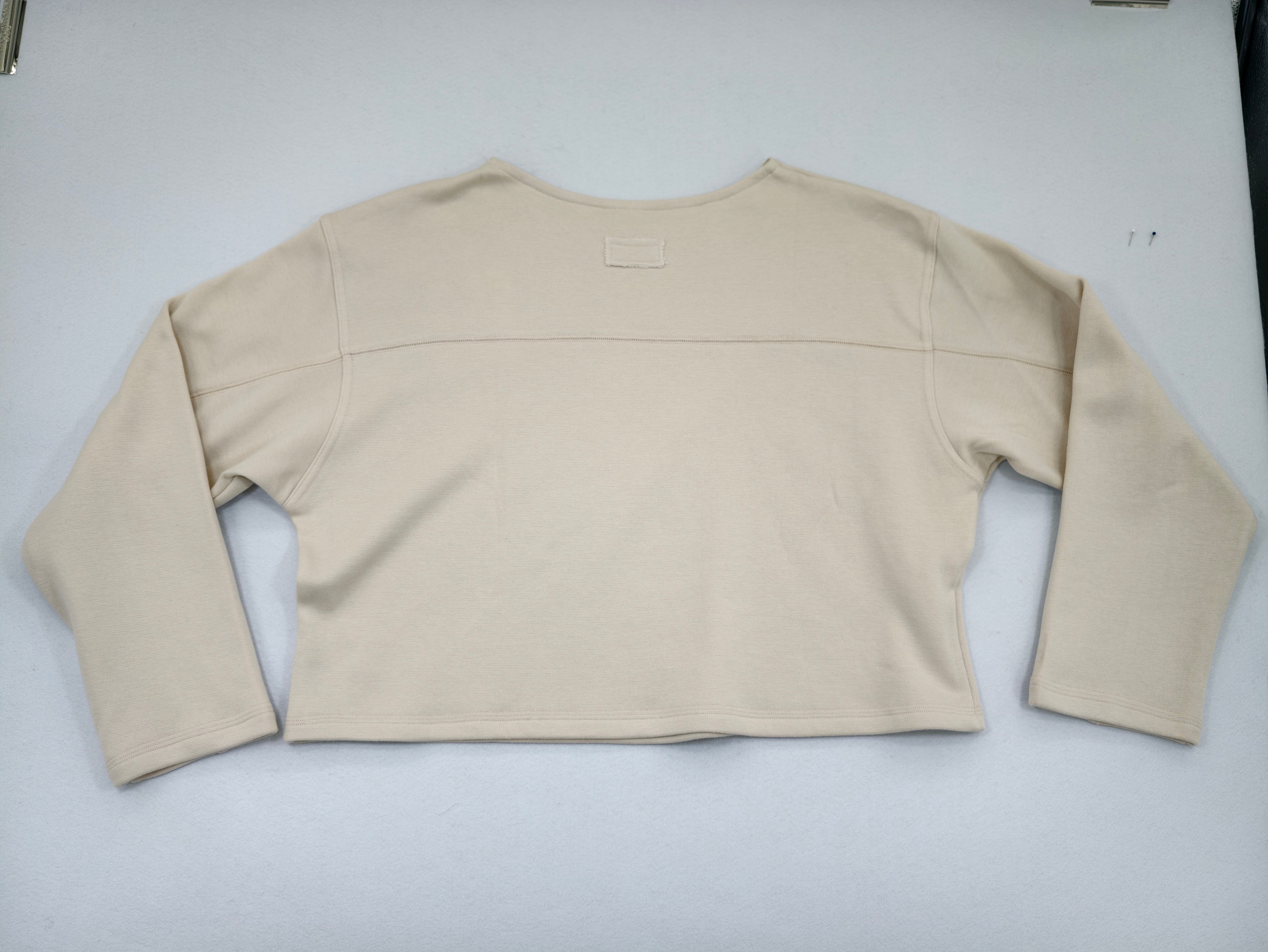 Back view with horizontal yoke seam and clean hem