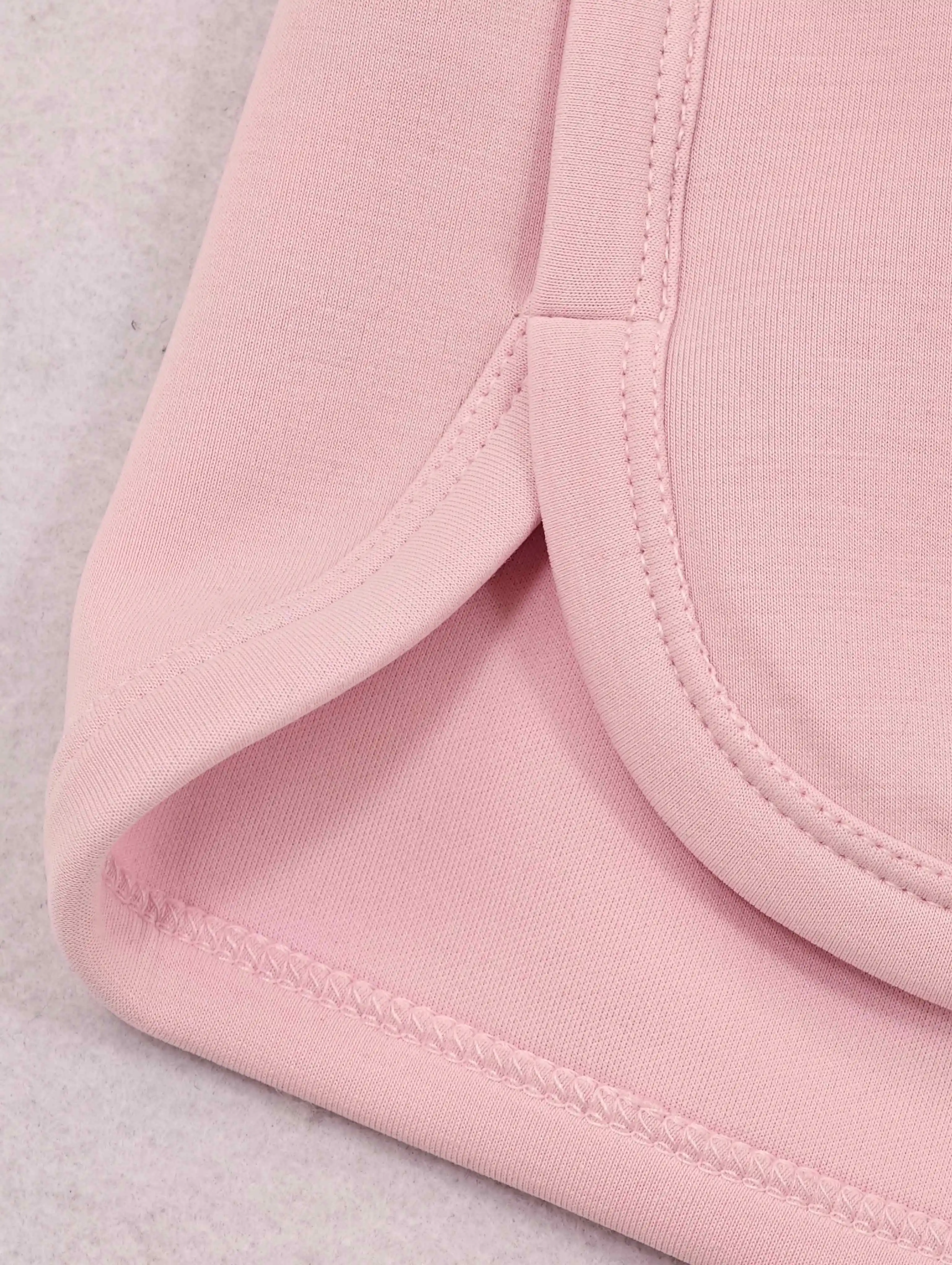 Curved dolphin hem with reinforced edge stitching