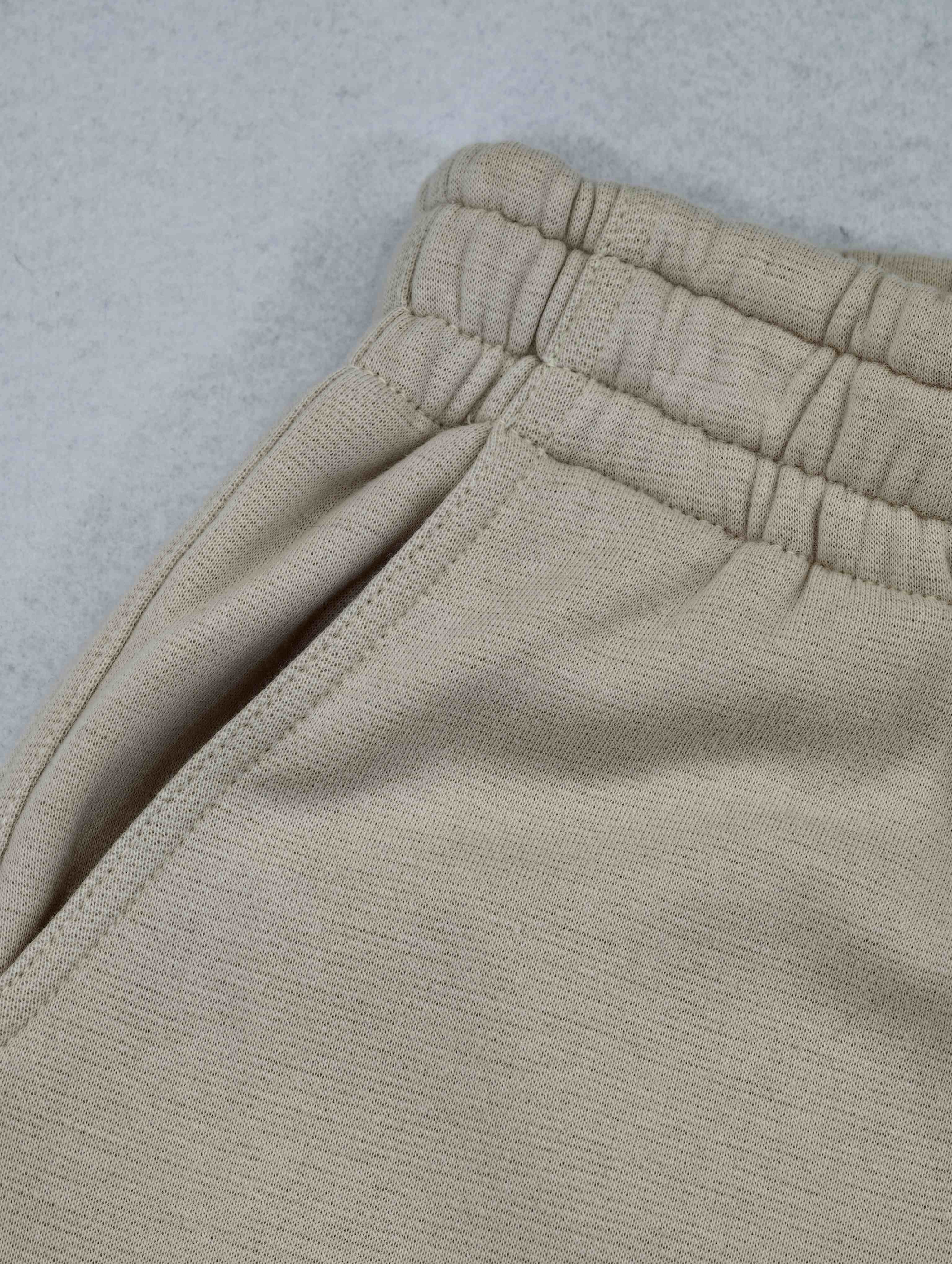 Custom side pocket and gathered waist construction detail