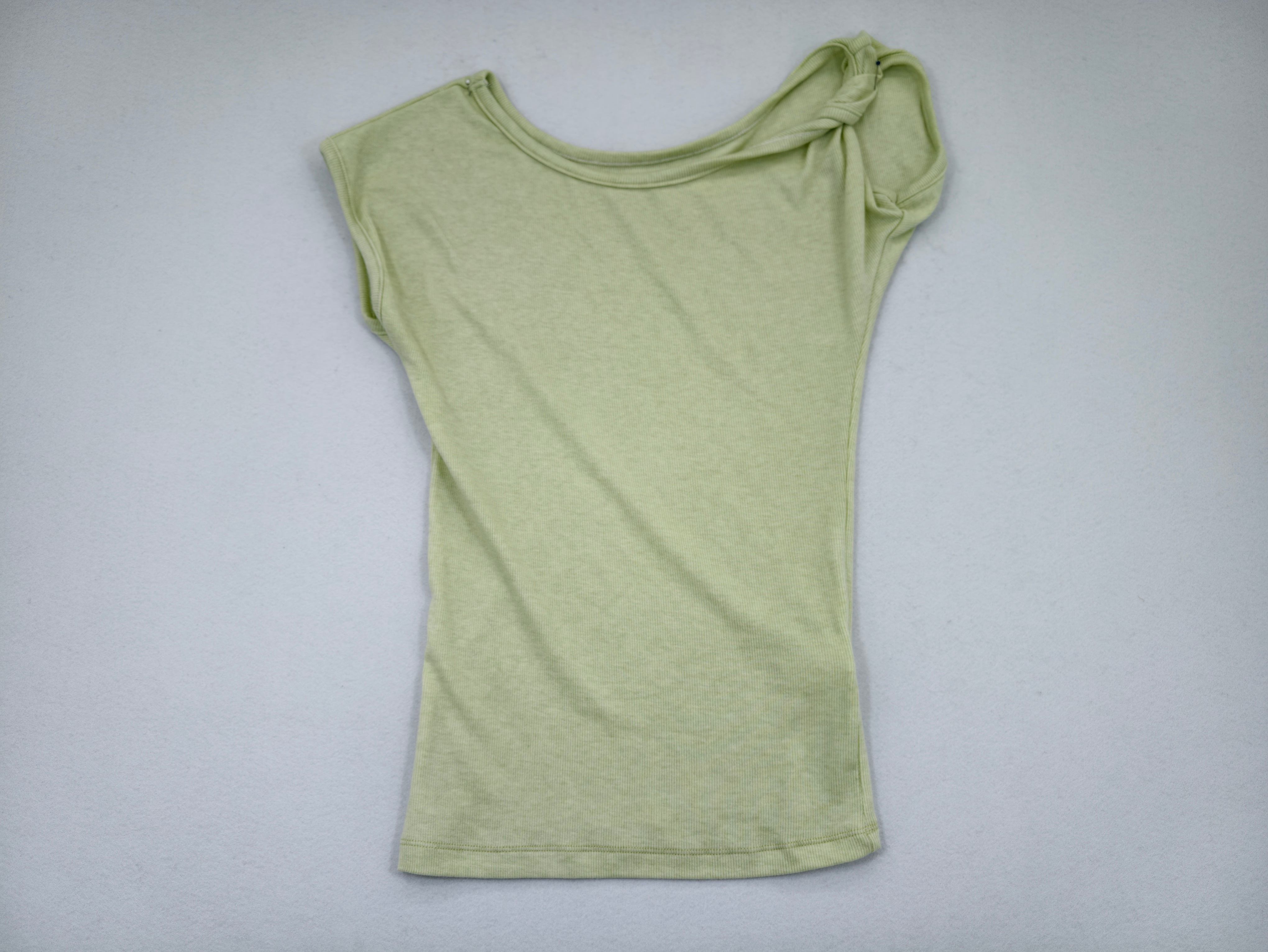 Sage asymmetric twist-shoulder rib top laid flat front view