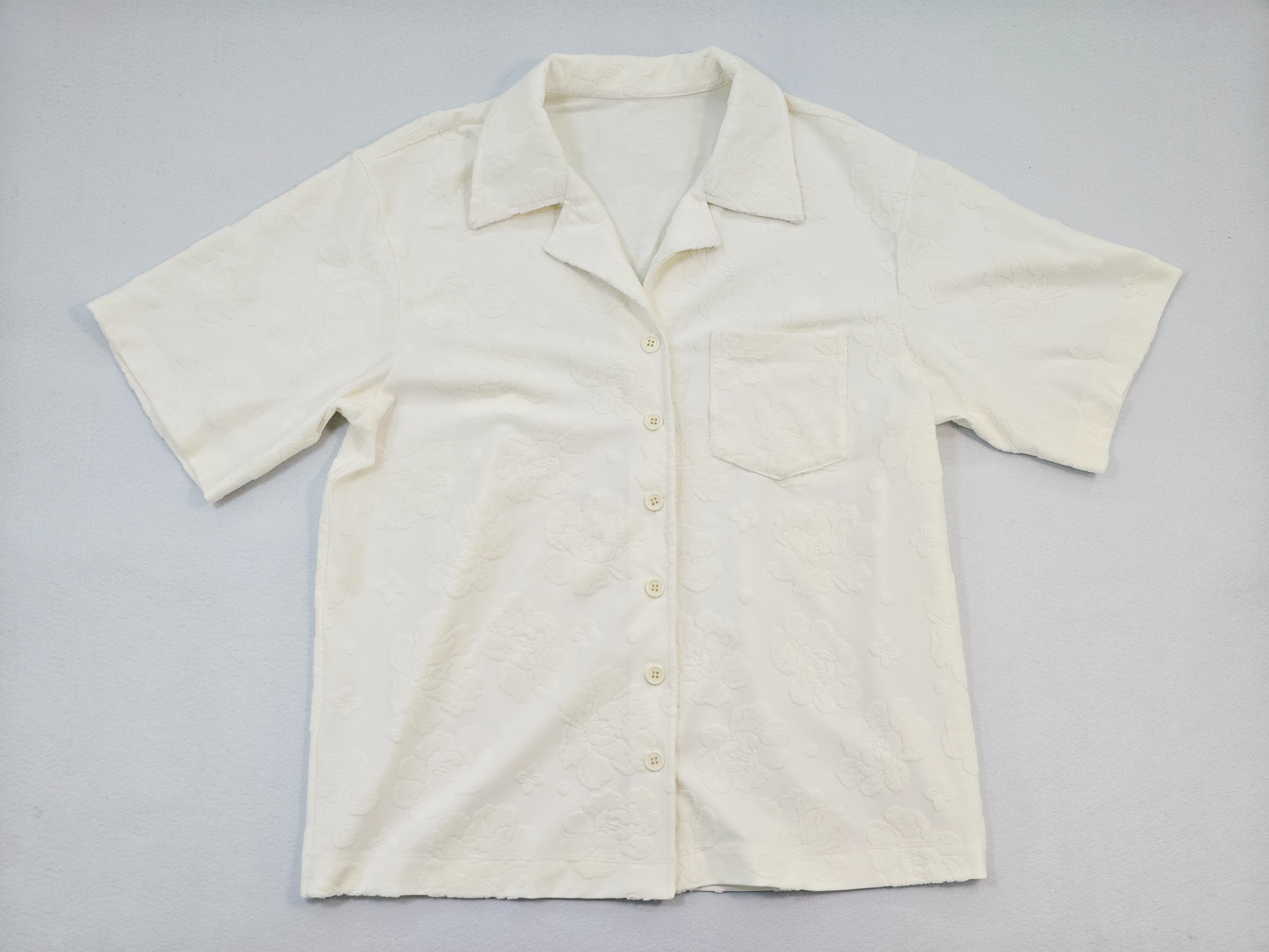 Ivory floral jacquard camp-collar shirt front flat view