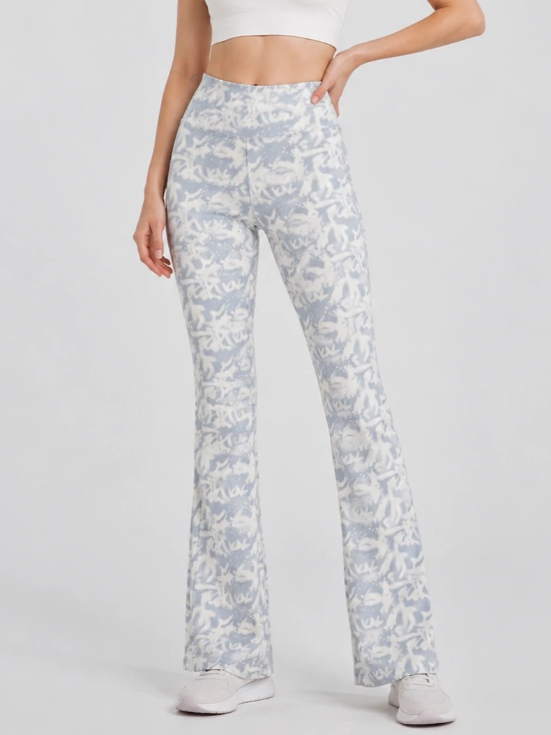 Model wearing light blue printed flare leggings