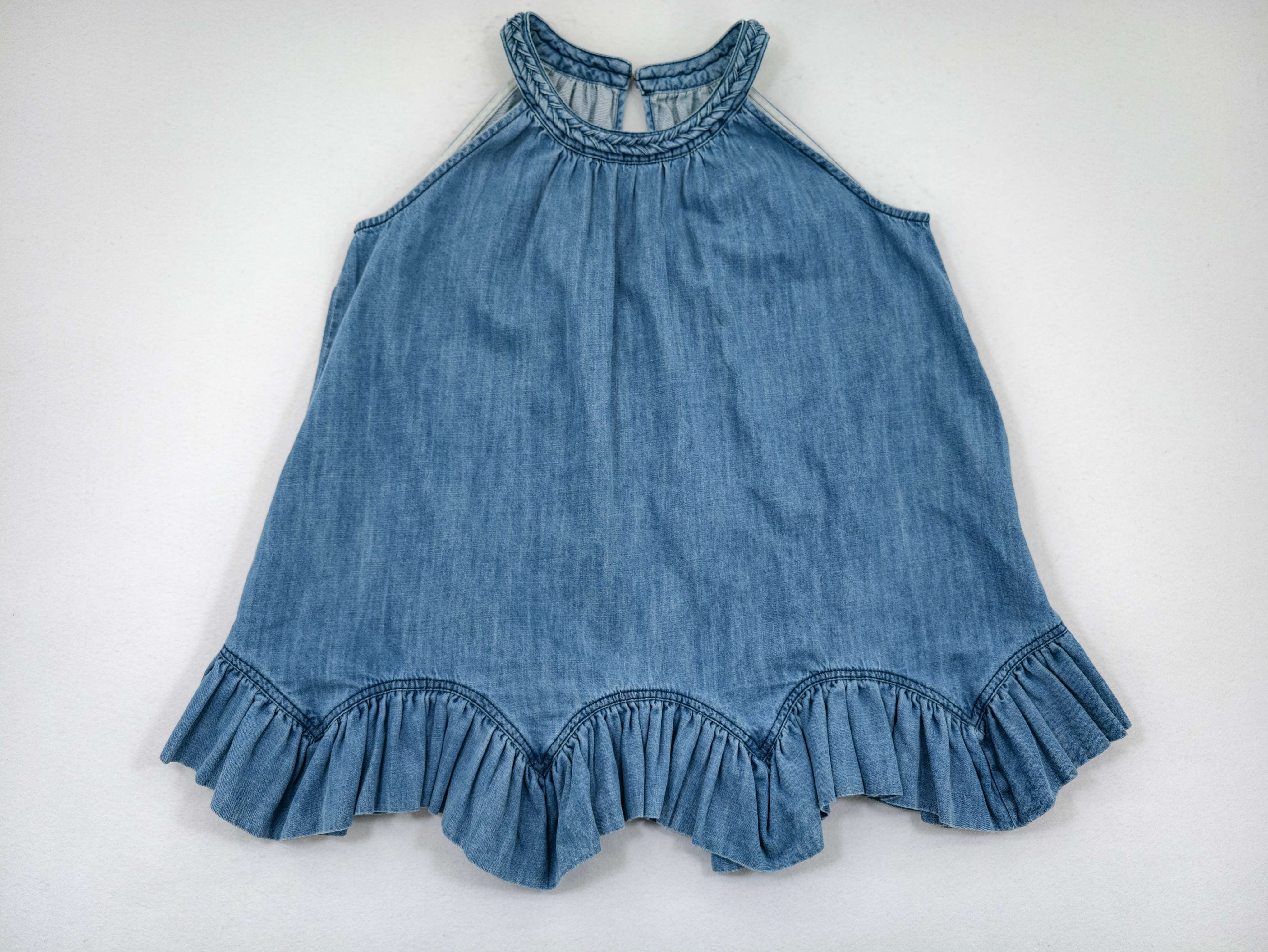 Blue TENCEL™ ruffle-hem halter top laid flat front view