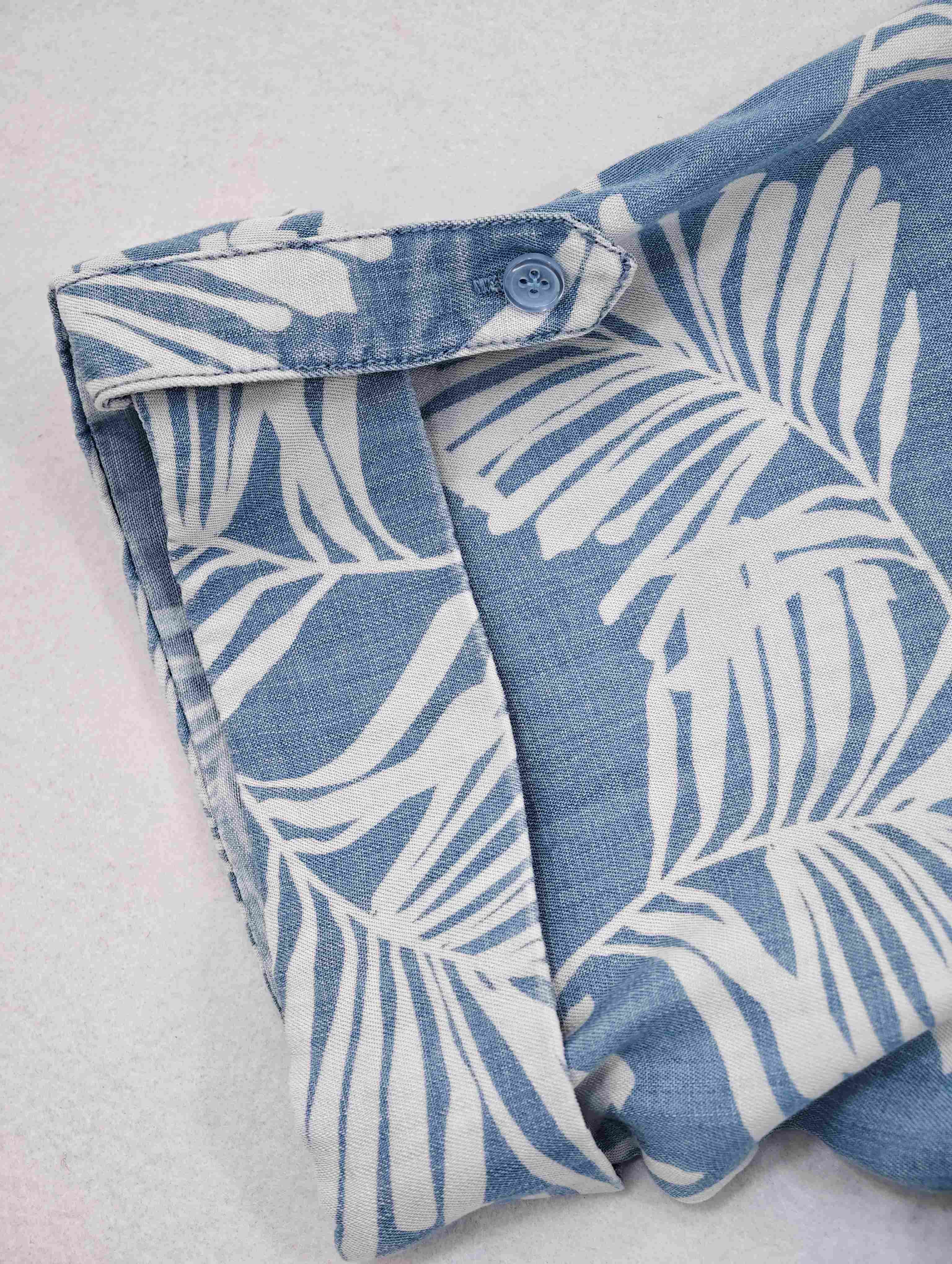 Roll-tab short sleeve with button fastening detail