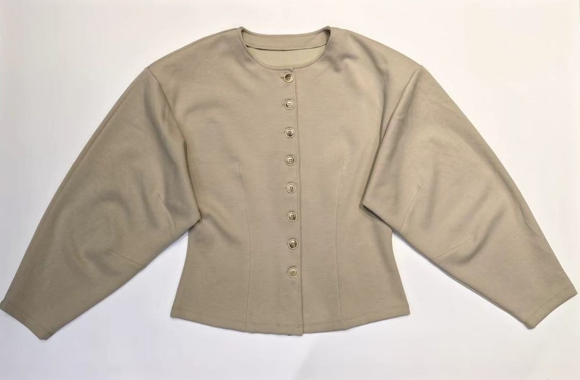 Round-neck peplum jacket prepared for private label sampling