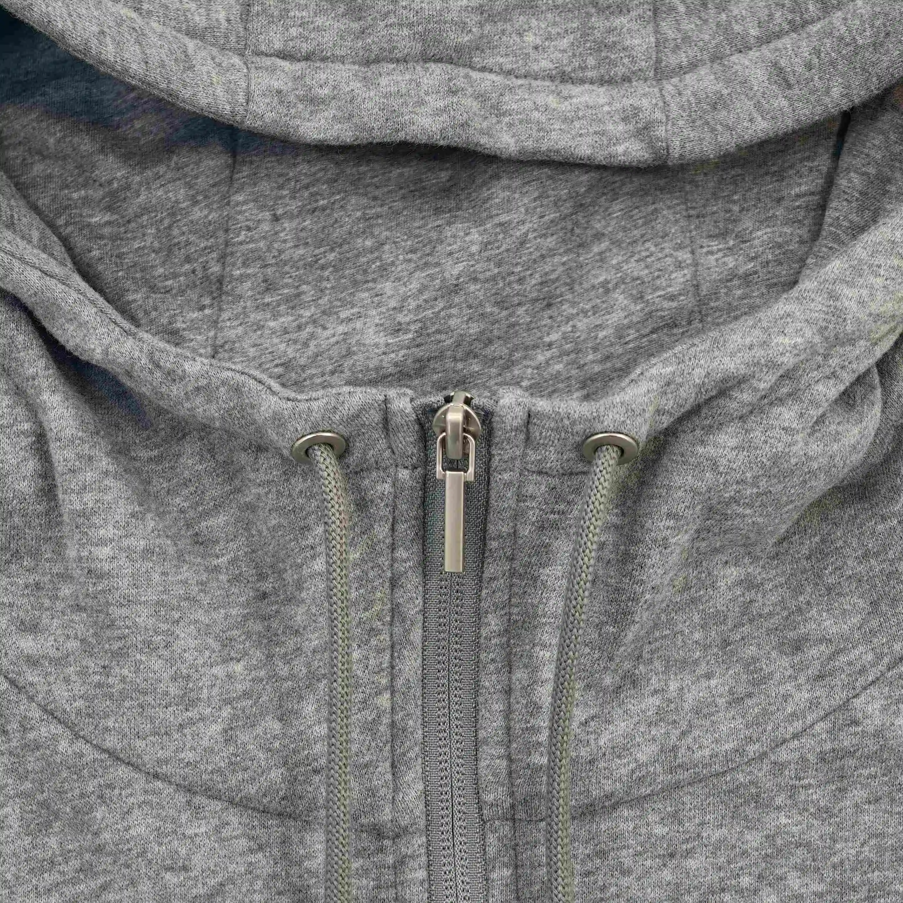 Adjustable hood and zipper neckline construction close-up