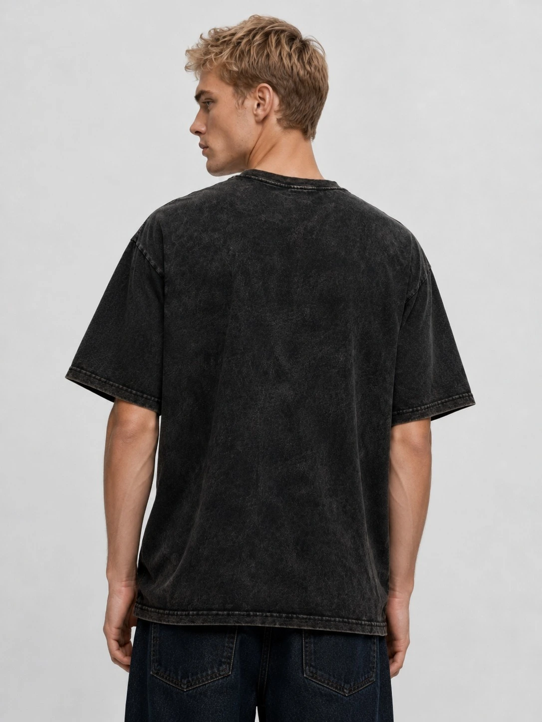 Back view of vintage washed oversized T-shirt from clothing supplier