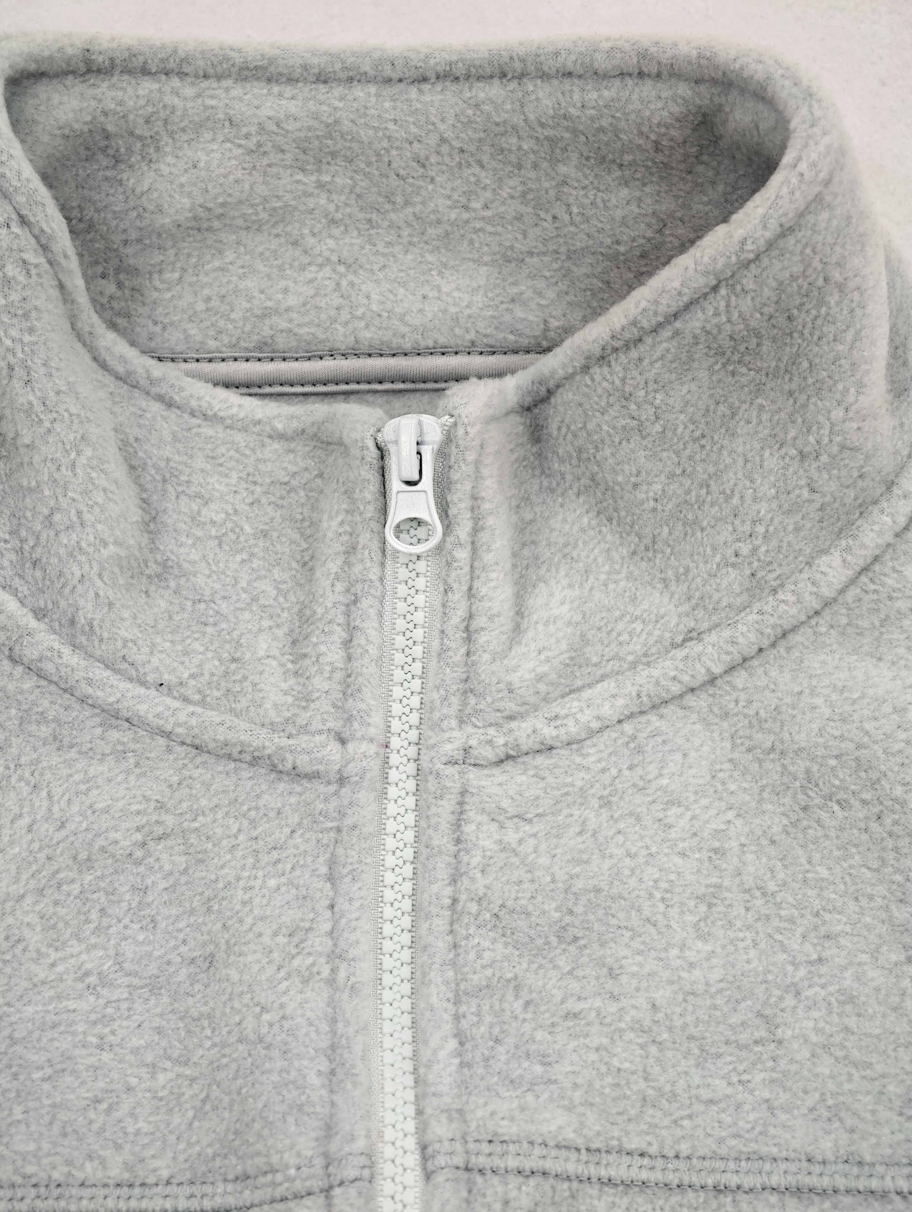 Stand collar and full zipper on recycled fleece vest