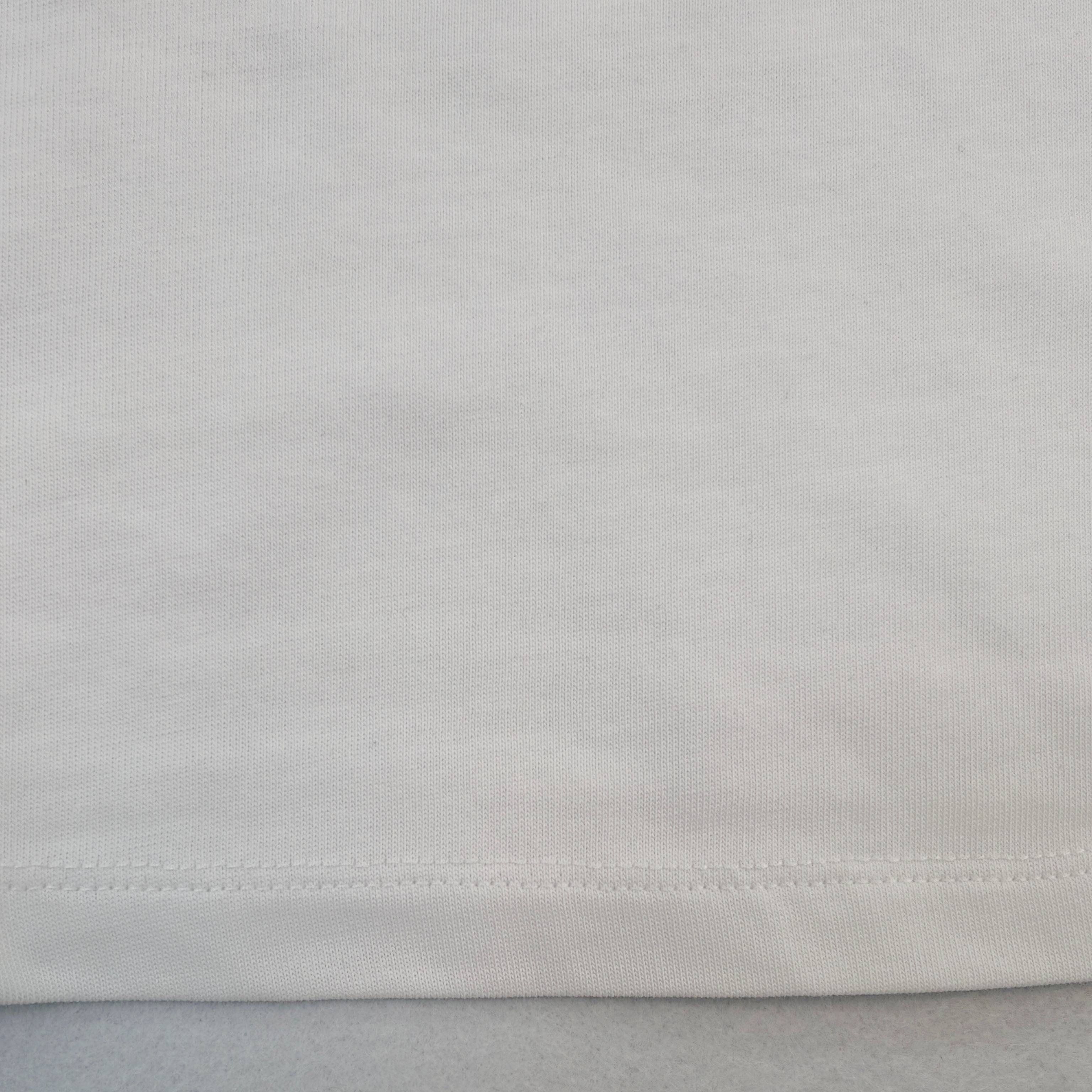 Smooth cotton fabric texture with twin-needle hem stitching
