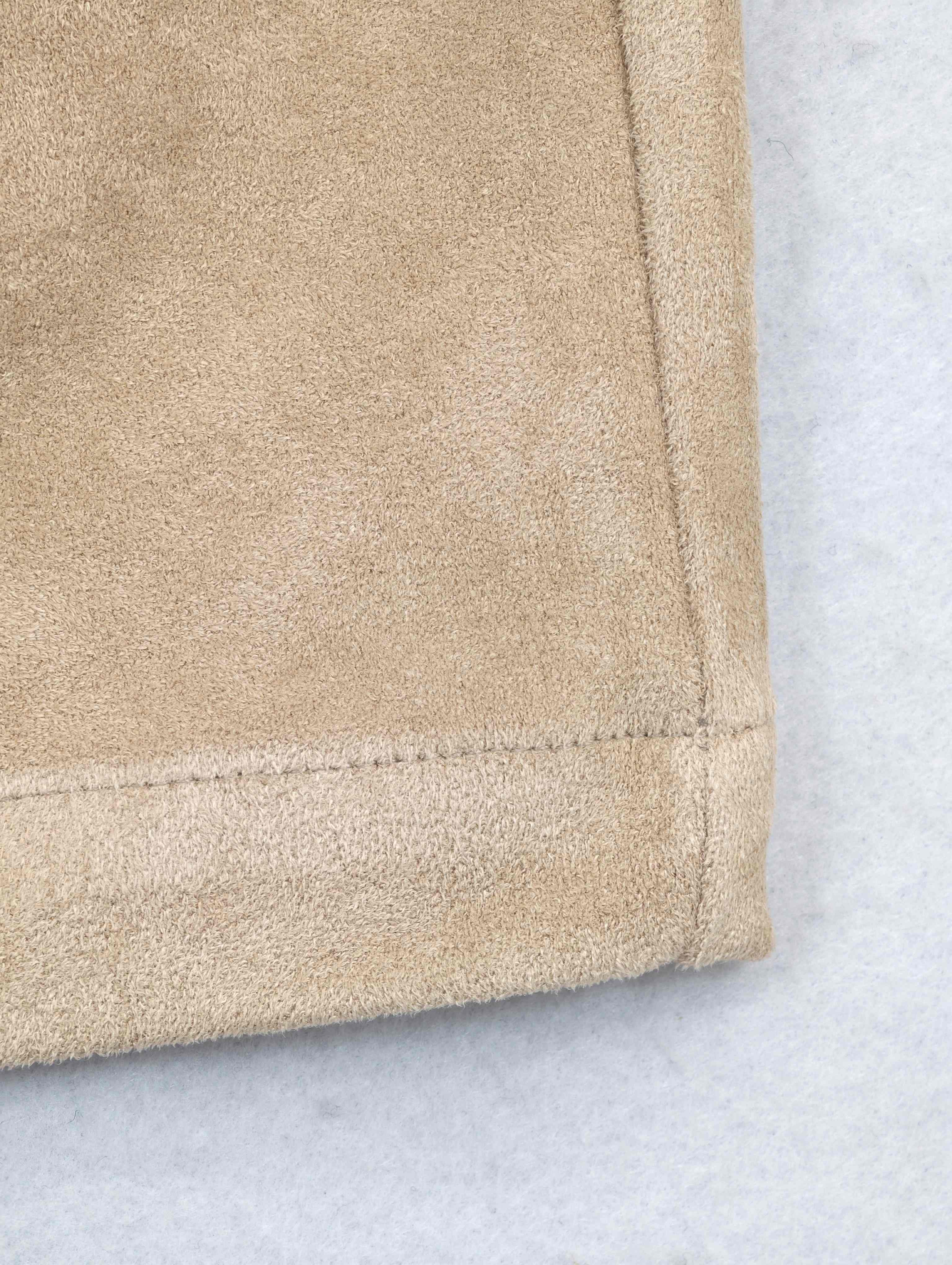 Clean mini skirt hem with reinforced stitching