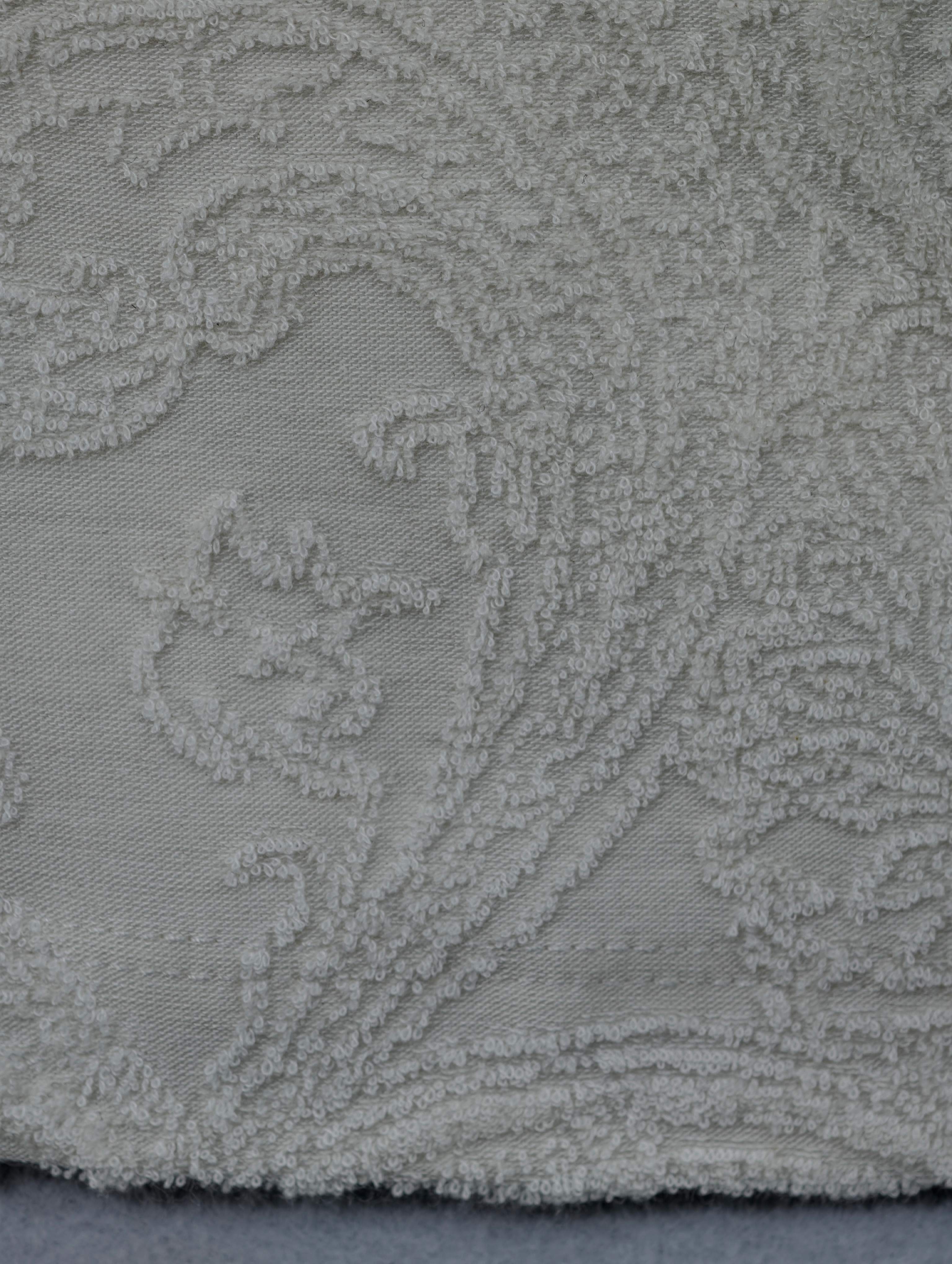 Raised paisley fabric texture and hem stitching detail