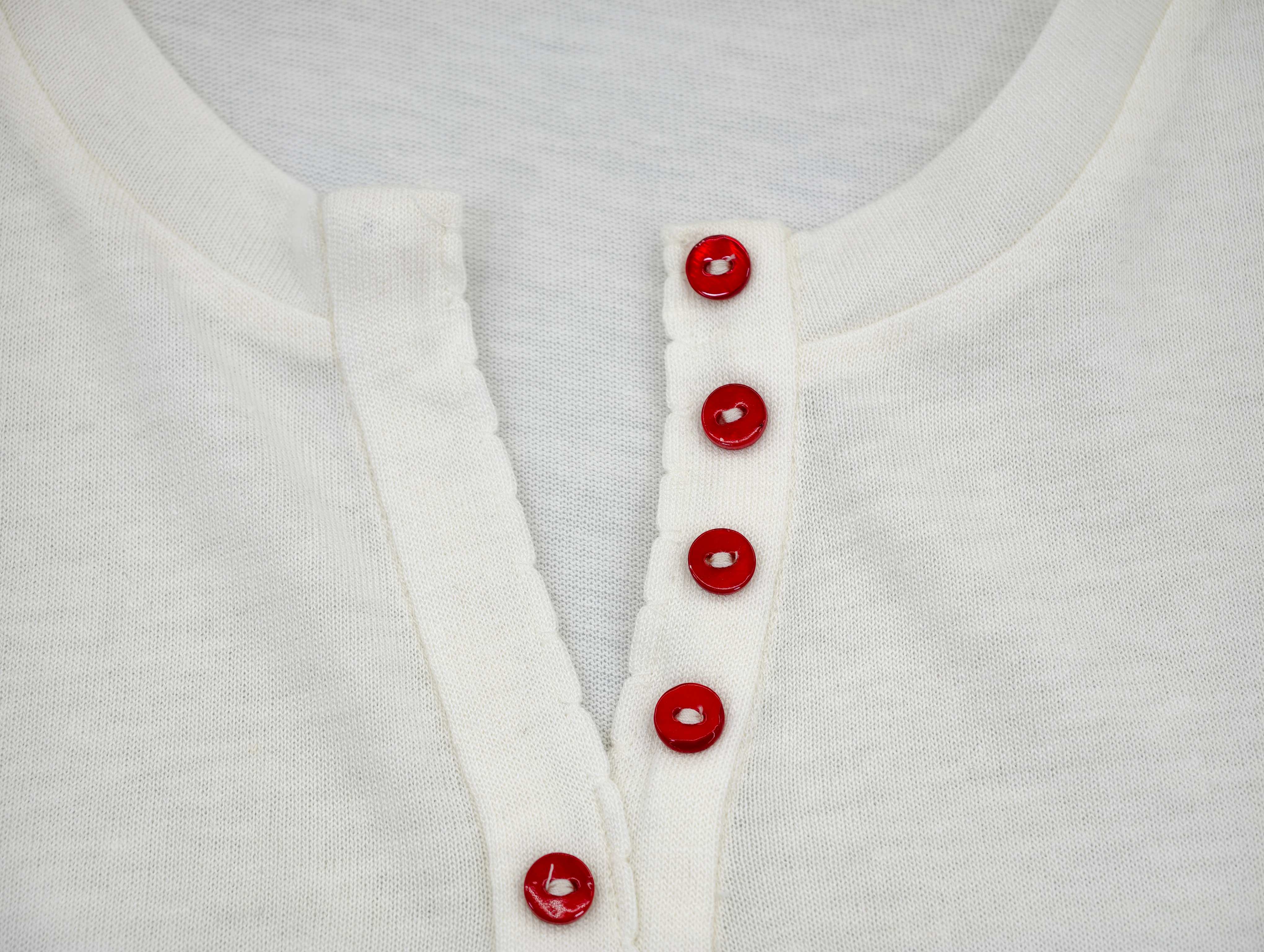 Red button Henley neckline detail for private label knitwear