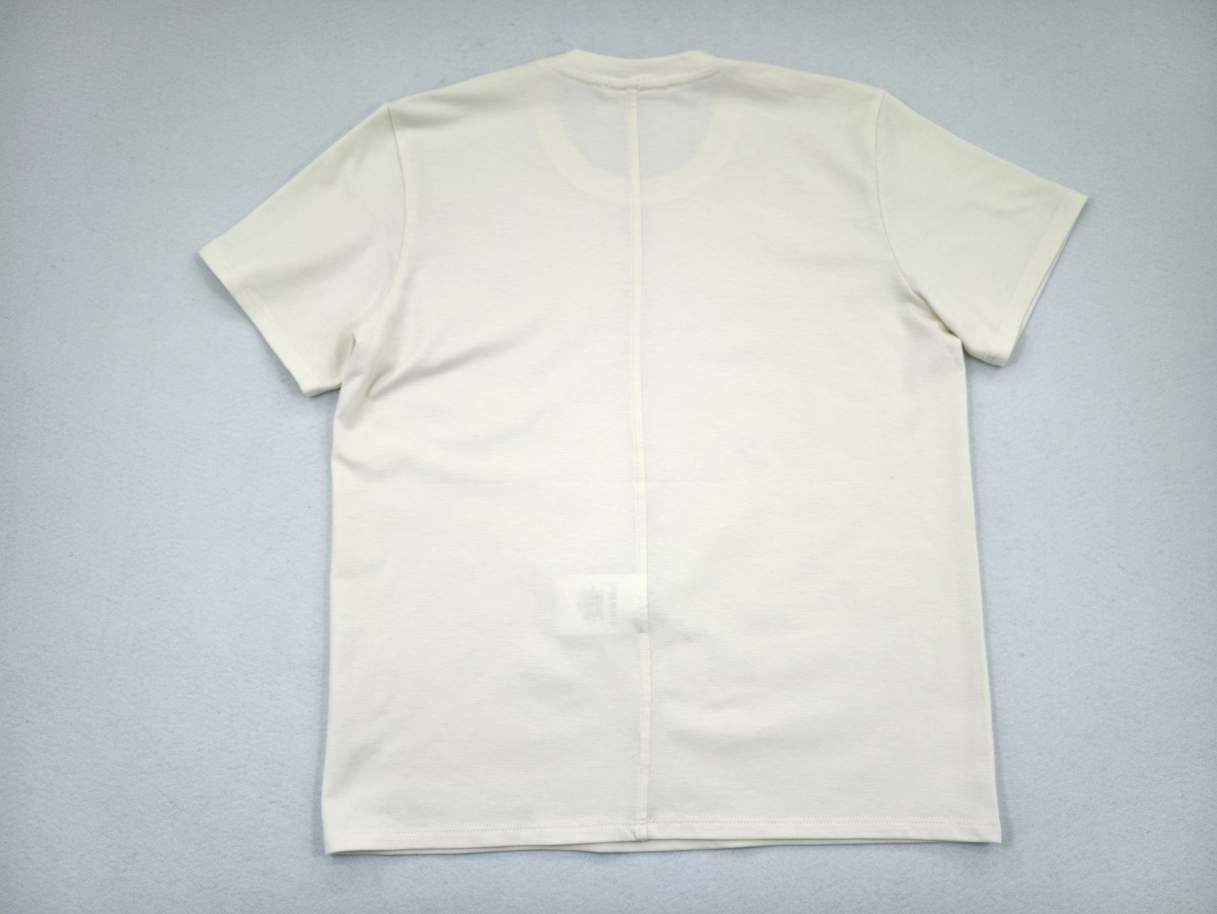 Center-back seam shapes the clean relaxed silhouette
