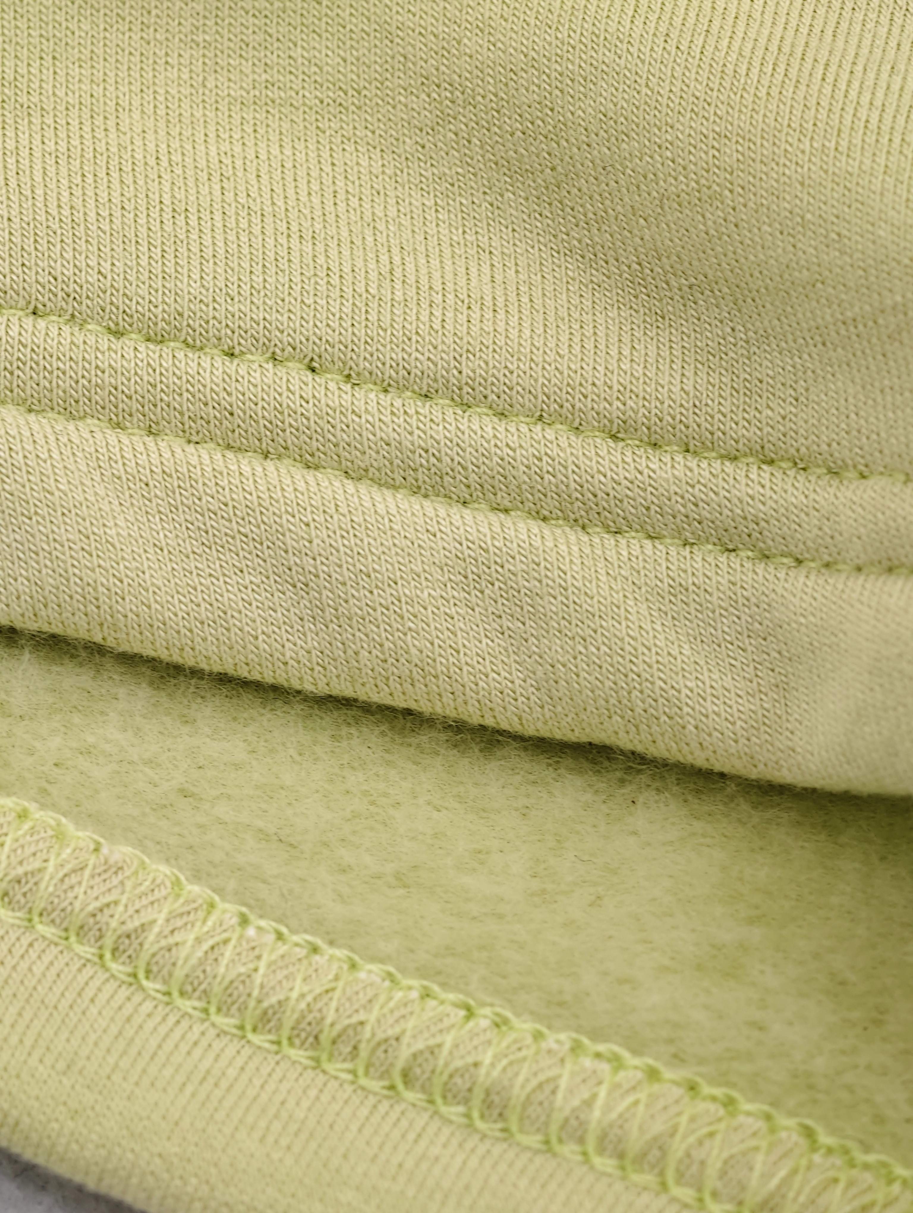 Soft terry fabric texture and hem stitching detail