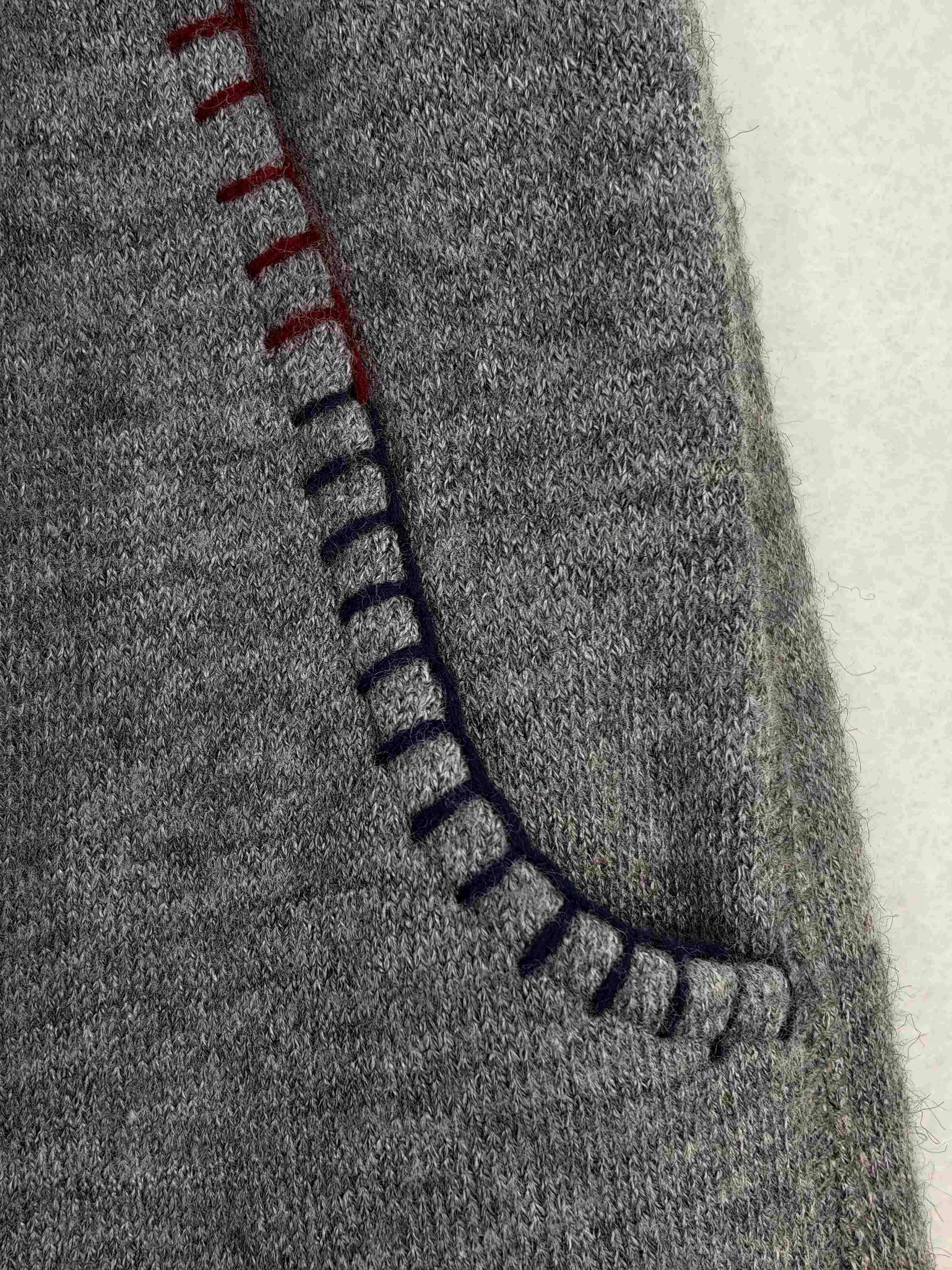Contrast stitched pocket on soft Hacci fabric