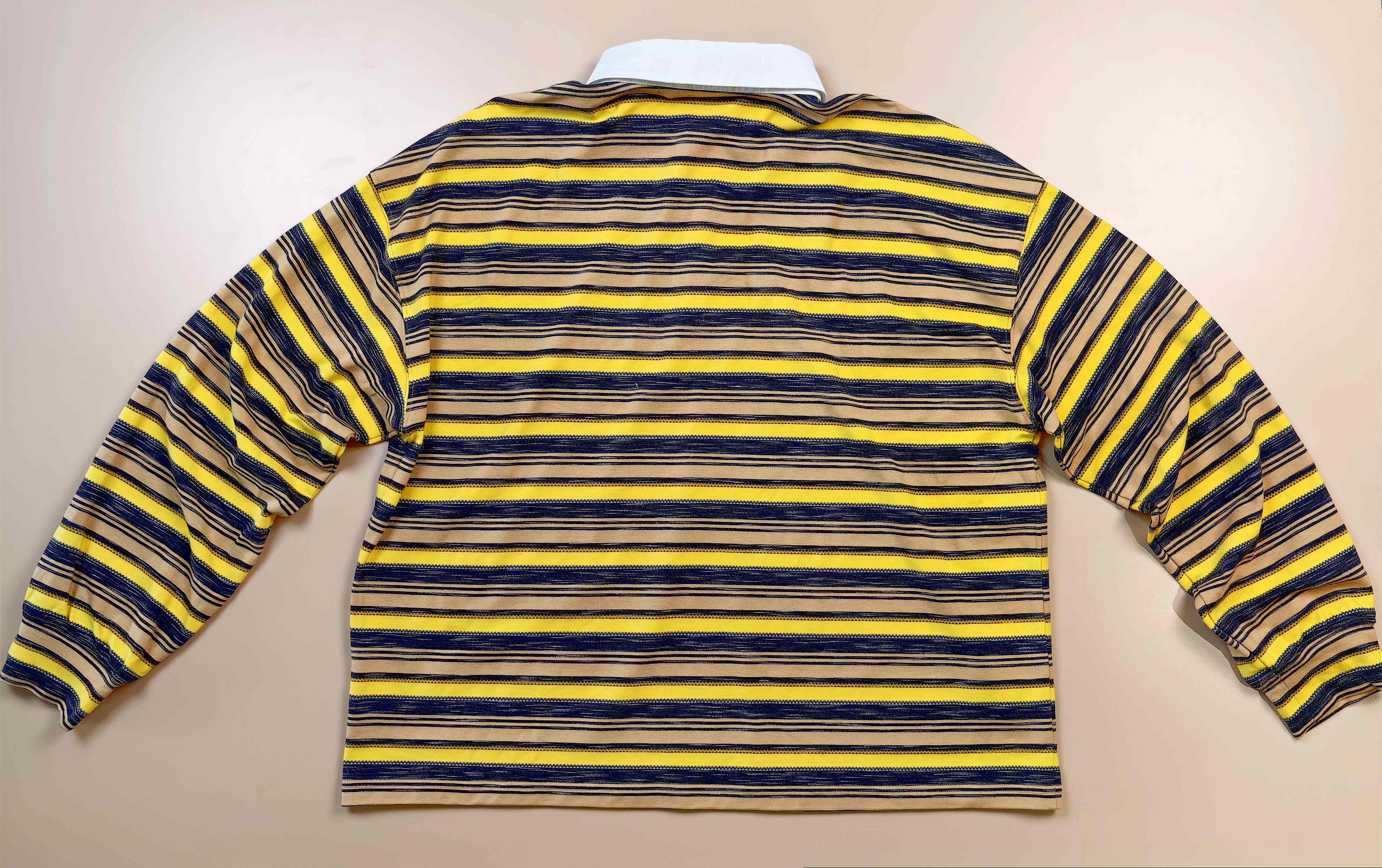 Back flat view showing stripe alignment across shoulder seams