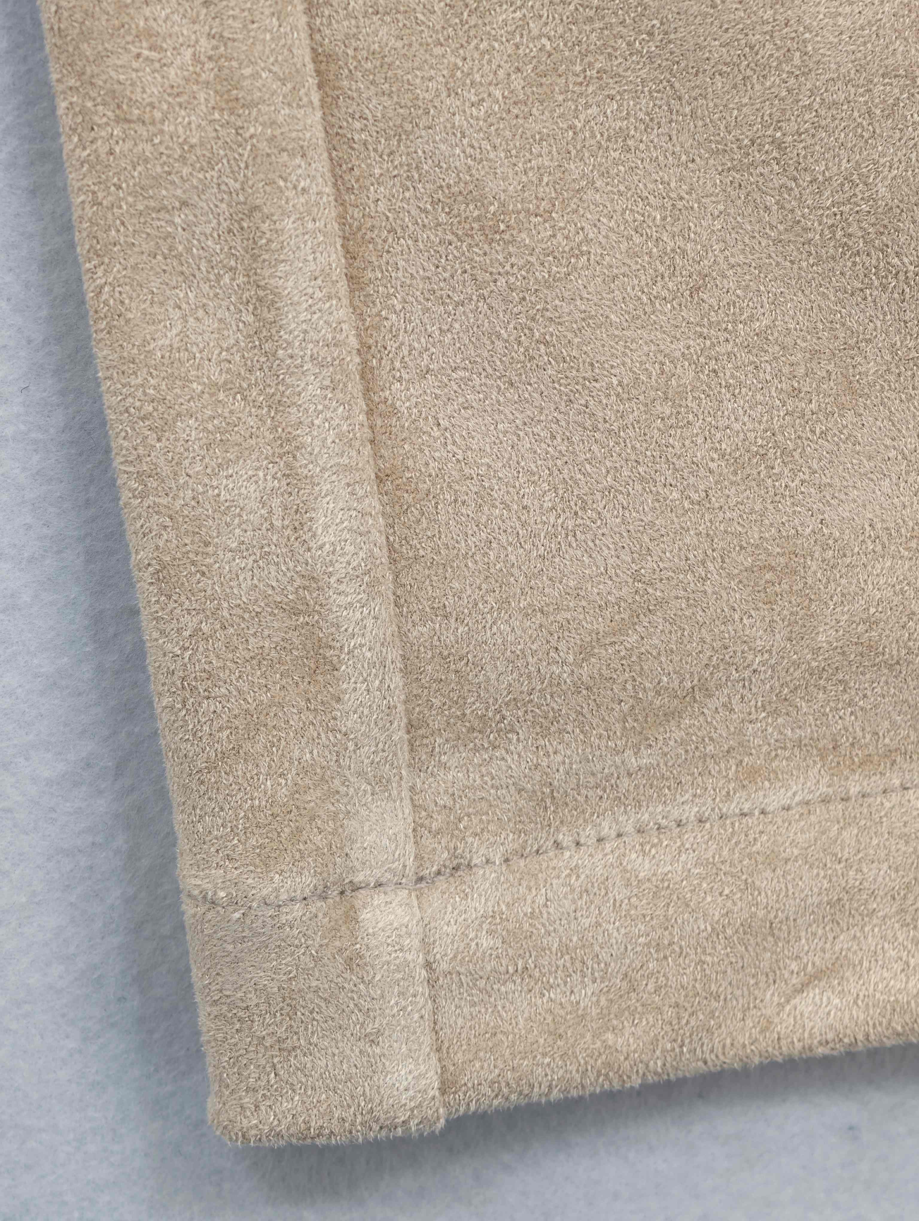 Wide-leg hem with clean stitching and suede-touch texture