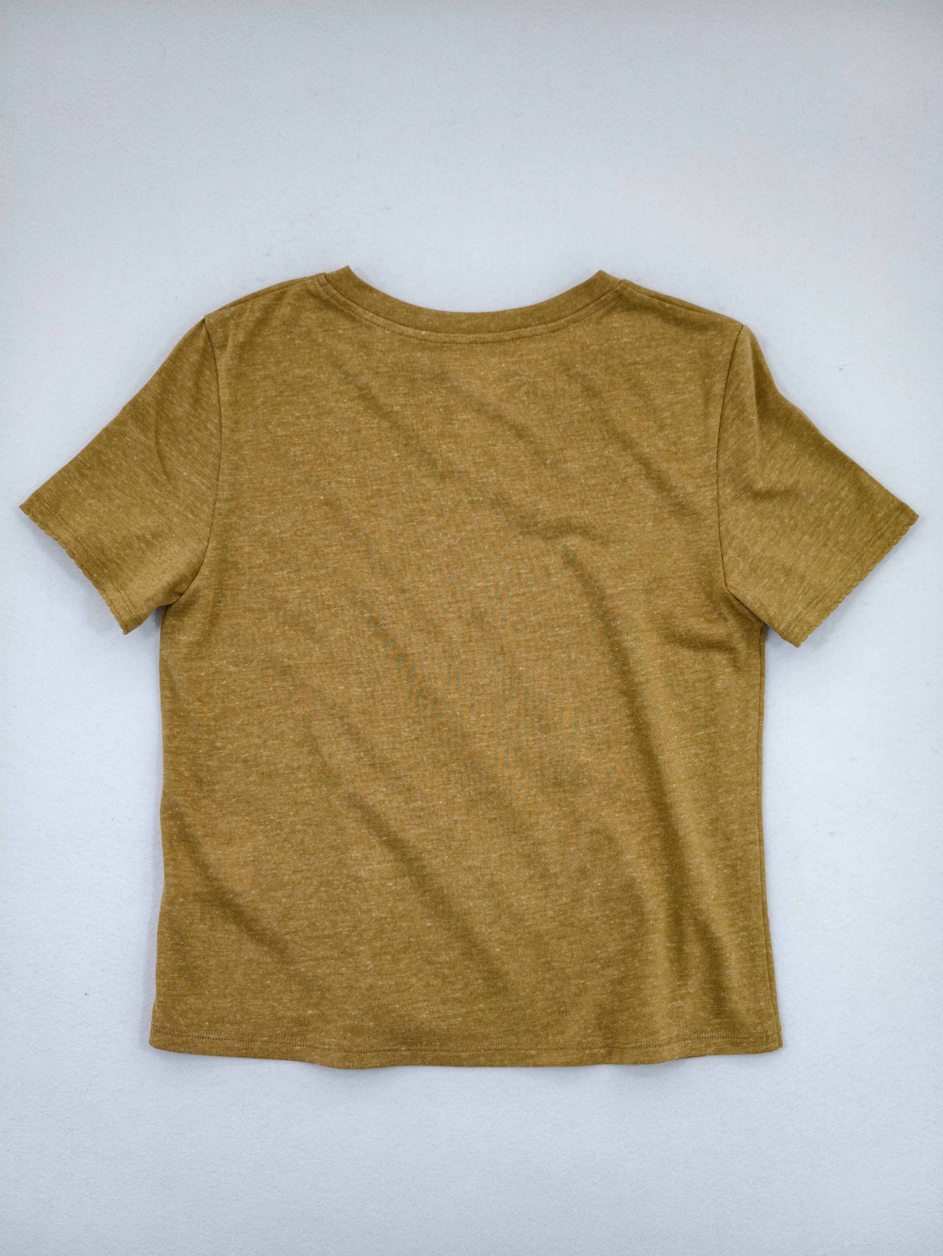 Back view showing relaxed fit and straight hemline
