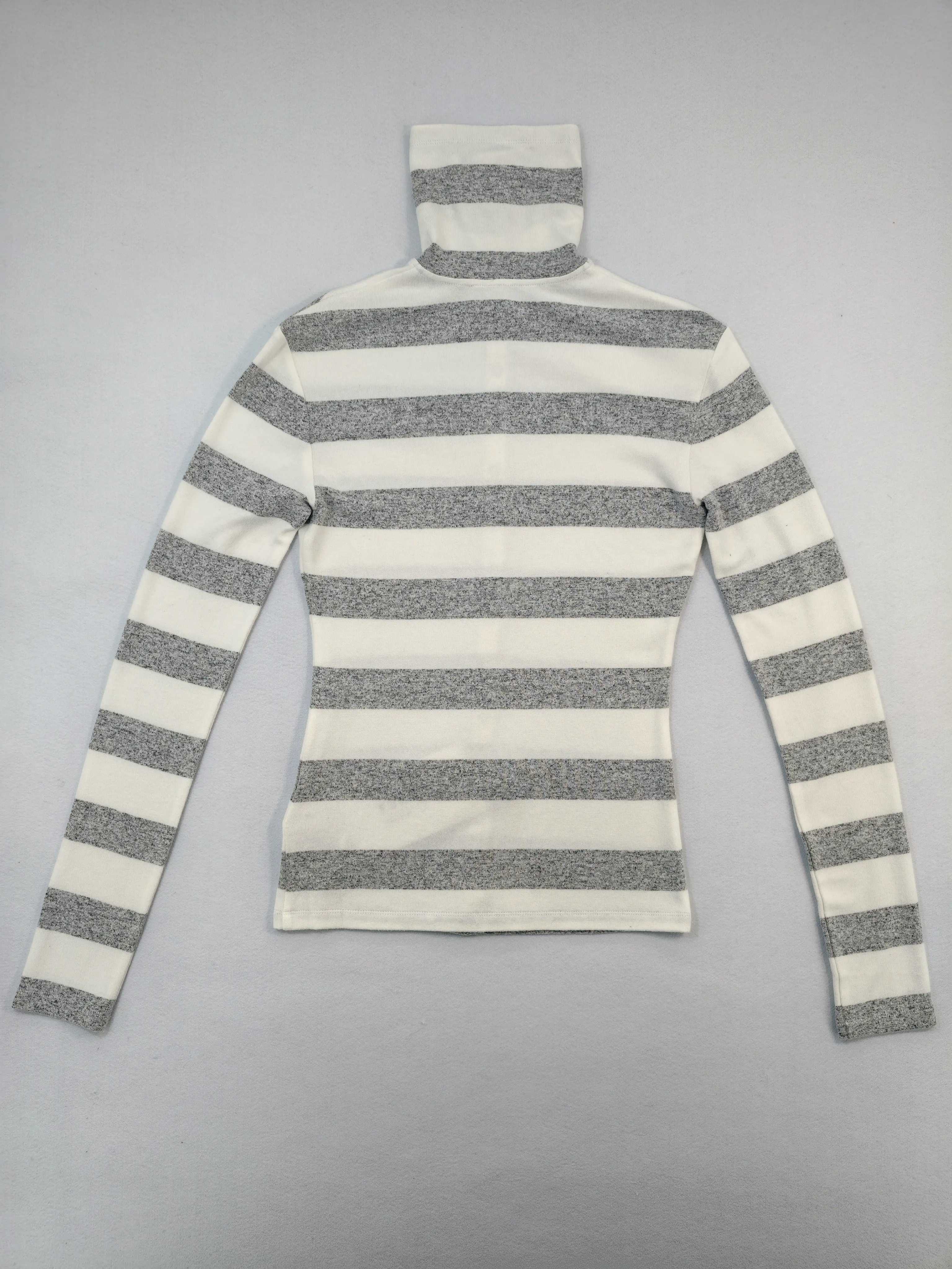 Back view showing fitted shape and yarn-dyed stripe layout