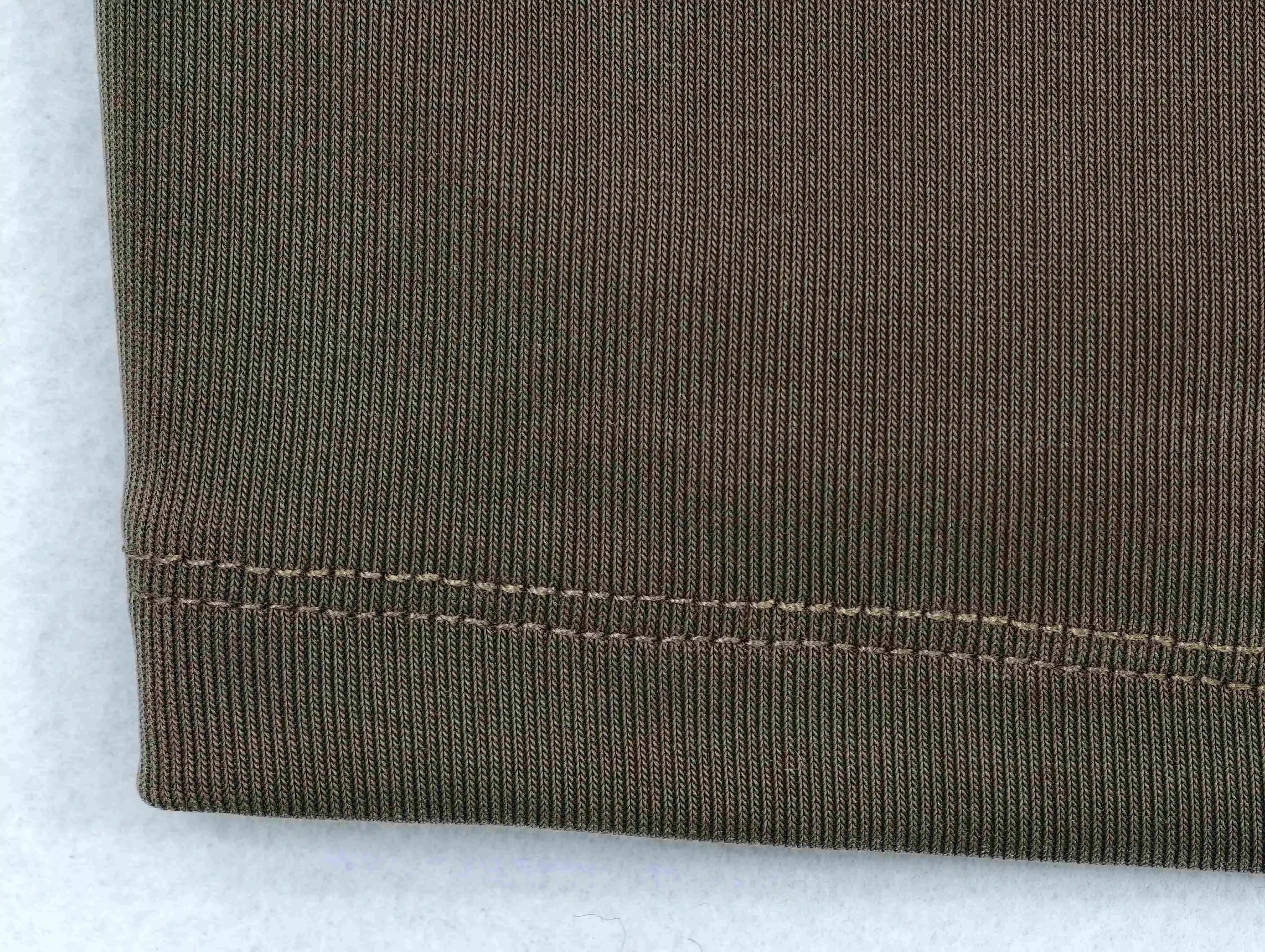 Clean coverstitched hem for consistent bulk production