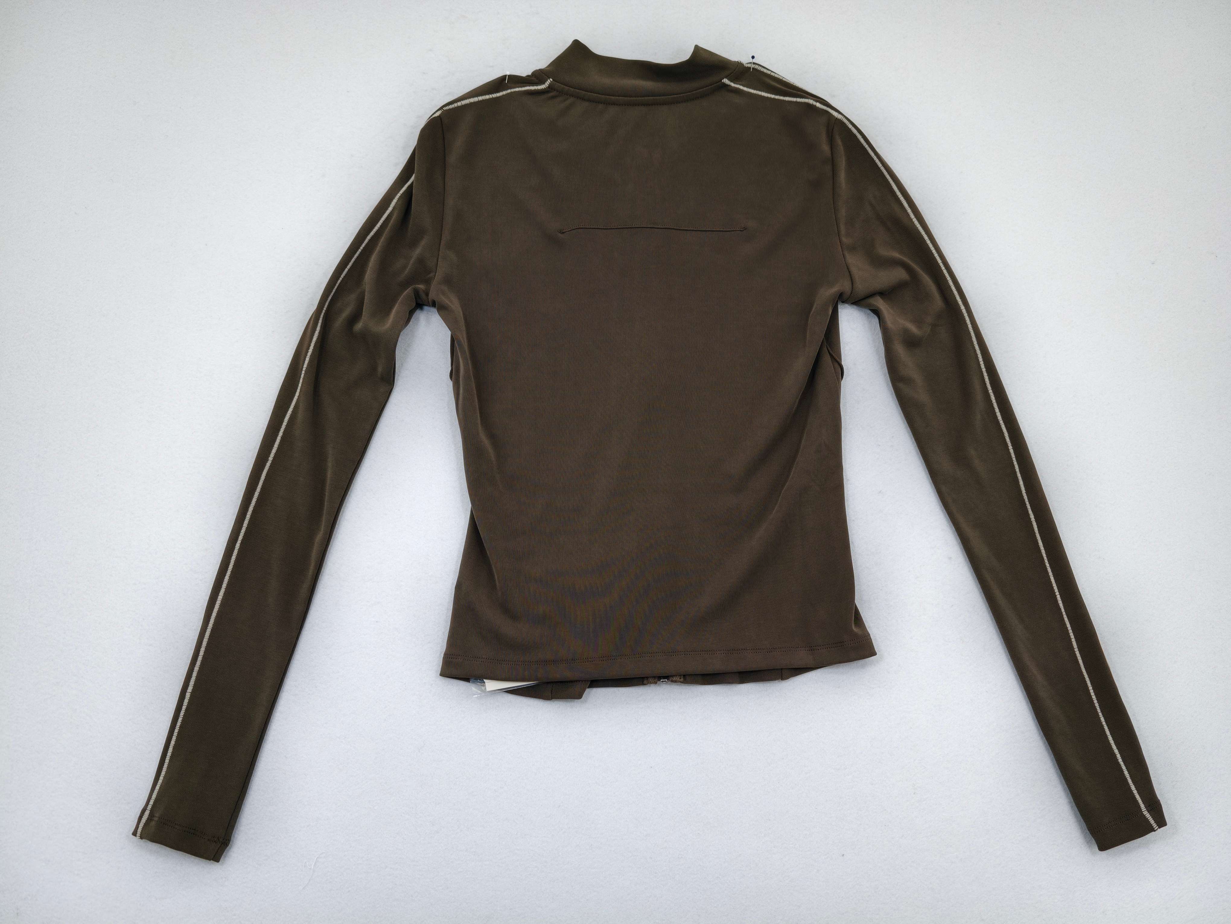 Fitted rib jacket back view for collection development