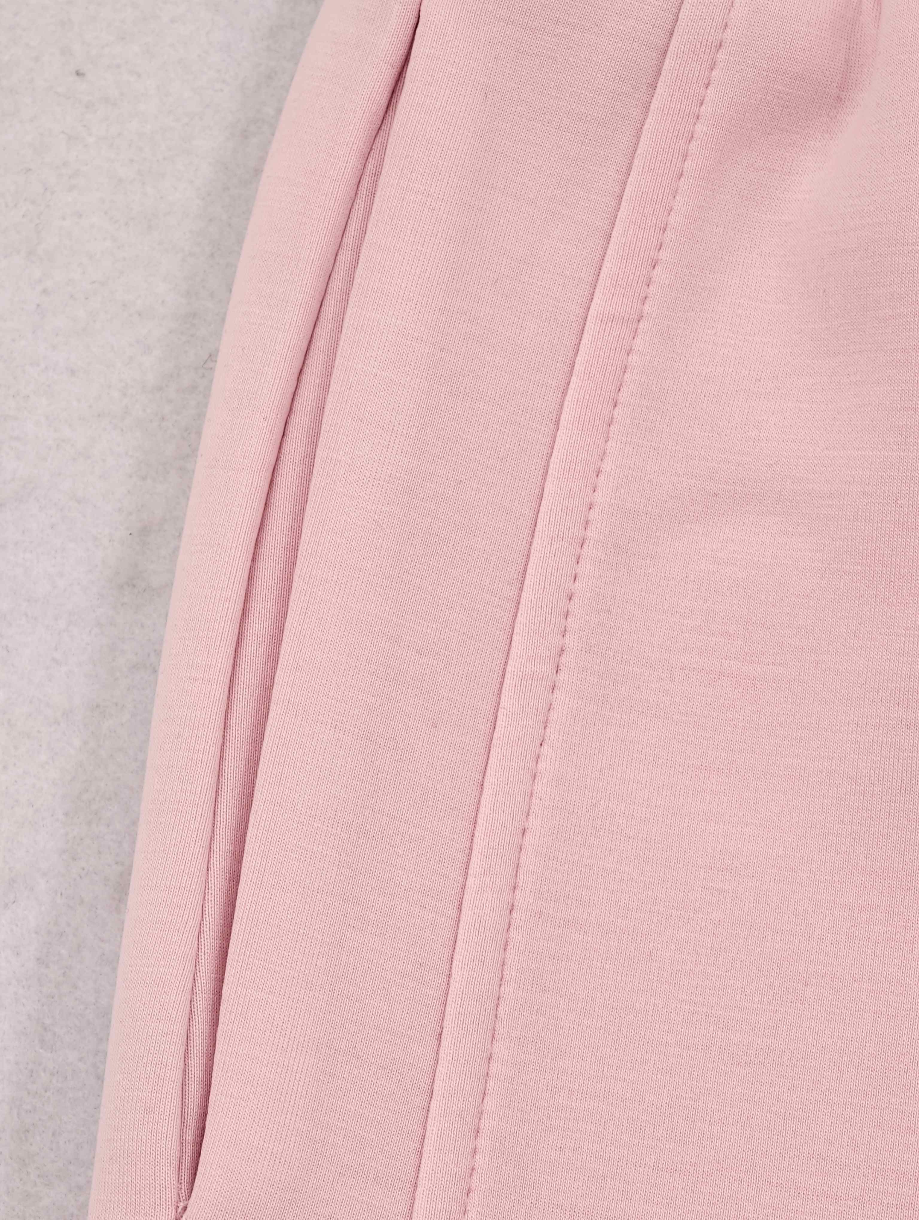 Close-up of side seam and neat topstitching
