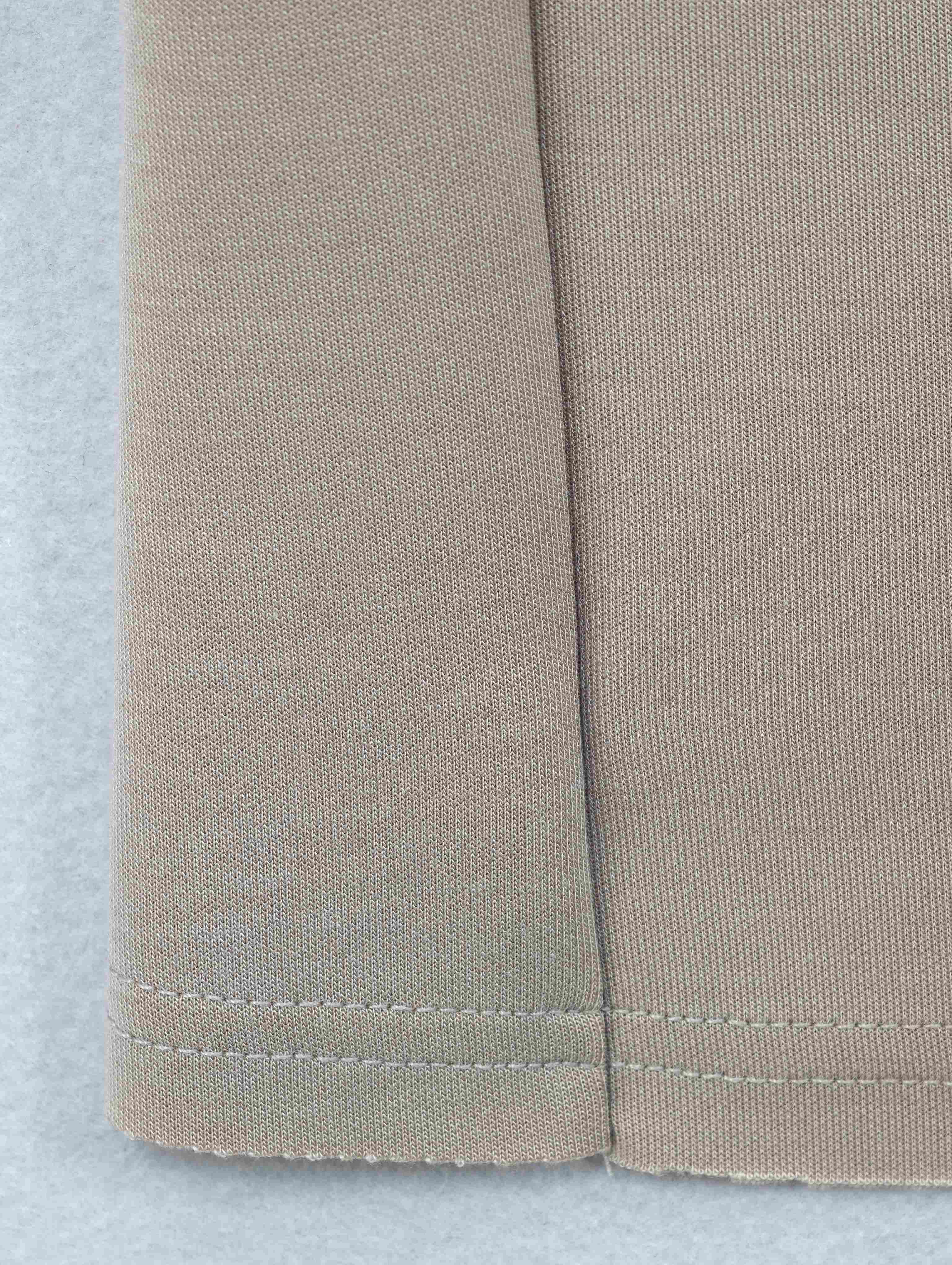 Straight hem and center-seam finishing close-up