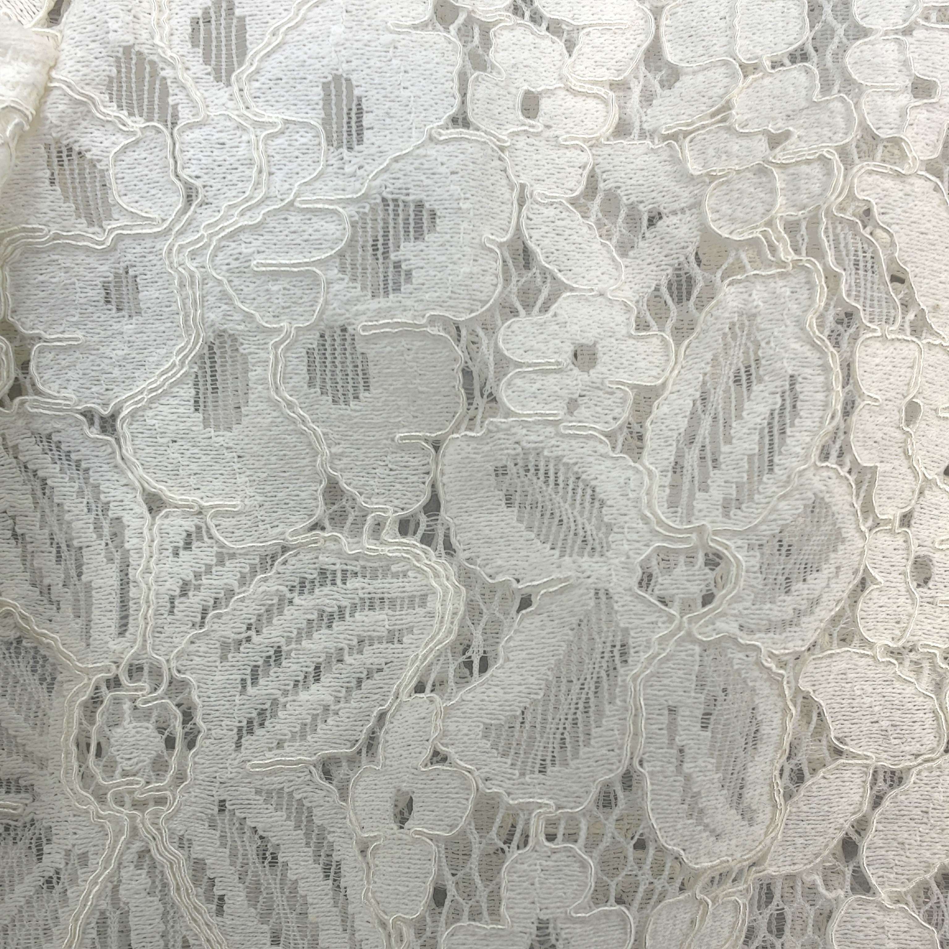 Floral guipure lace pattern and openwork texture detail