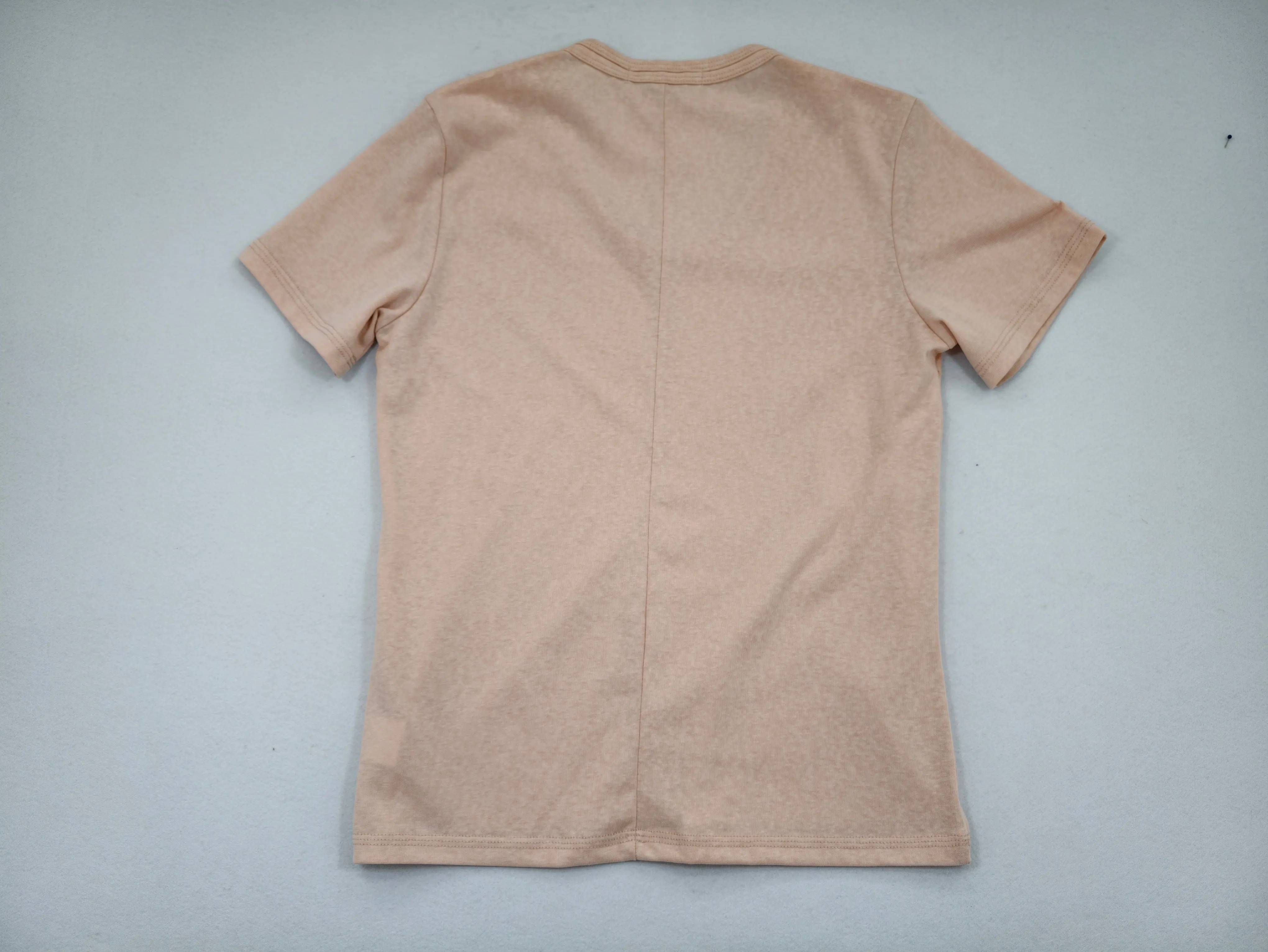 Center-back seam defines the clean fitted rear silhouette