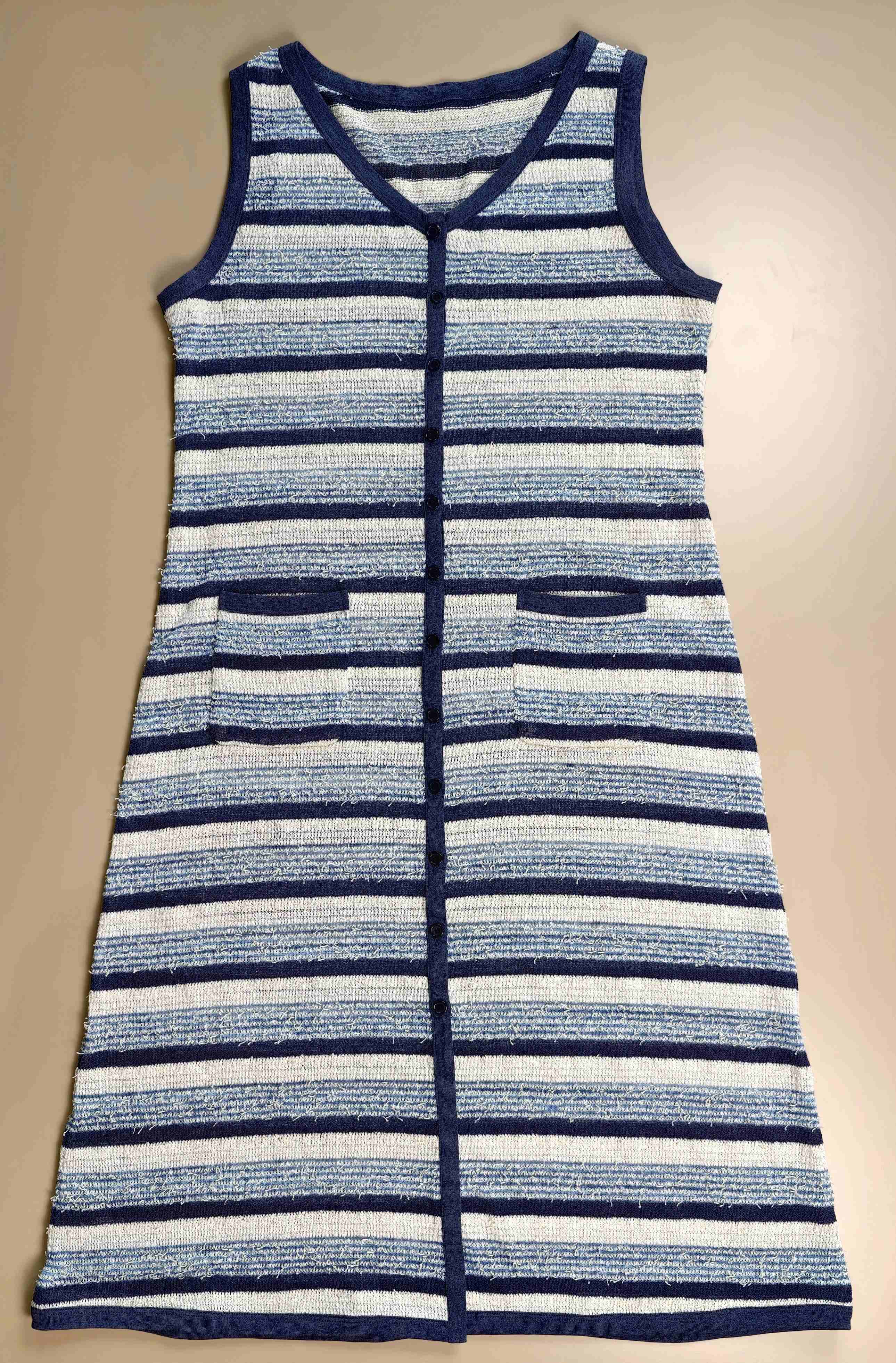 Flat front view with contrast trim and pockets