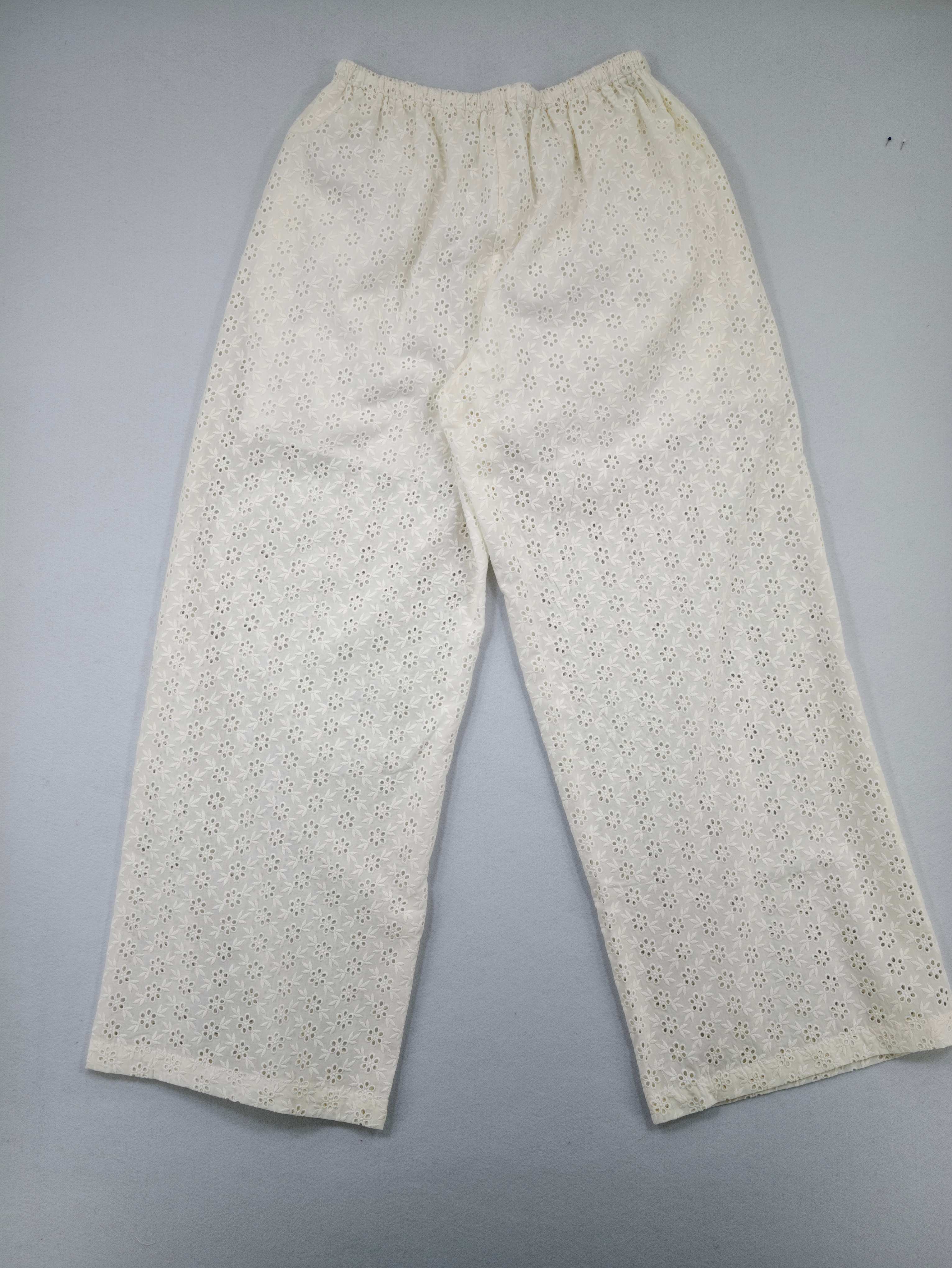 Back view of relaxed embroidered straight-leg trousers