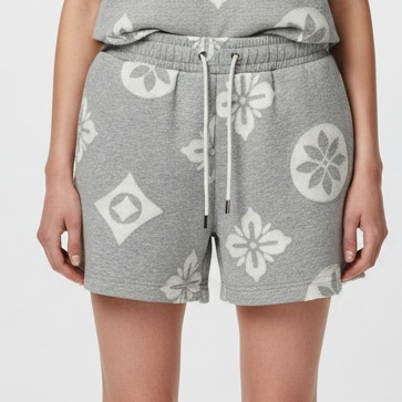 Laser burn-out bonded terry shorts styled on model