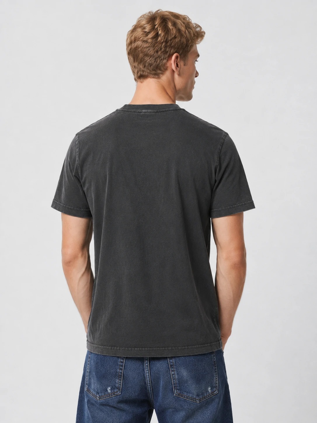 Back view showing relaxed fit and faded seam finish