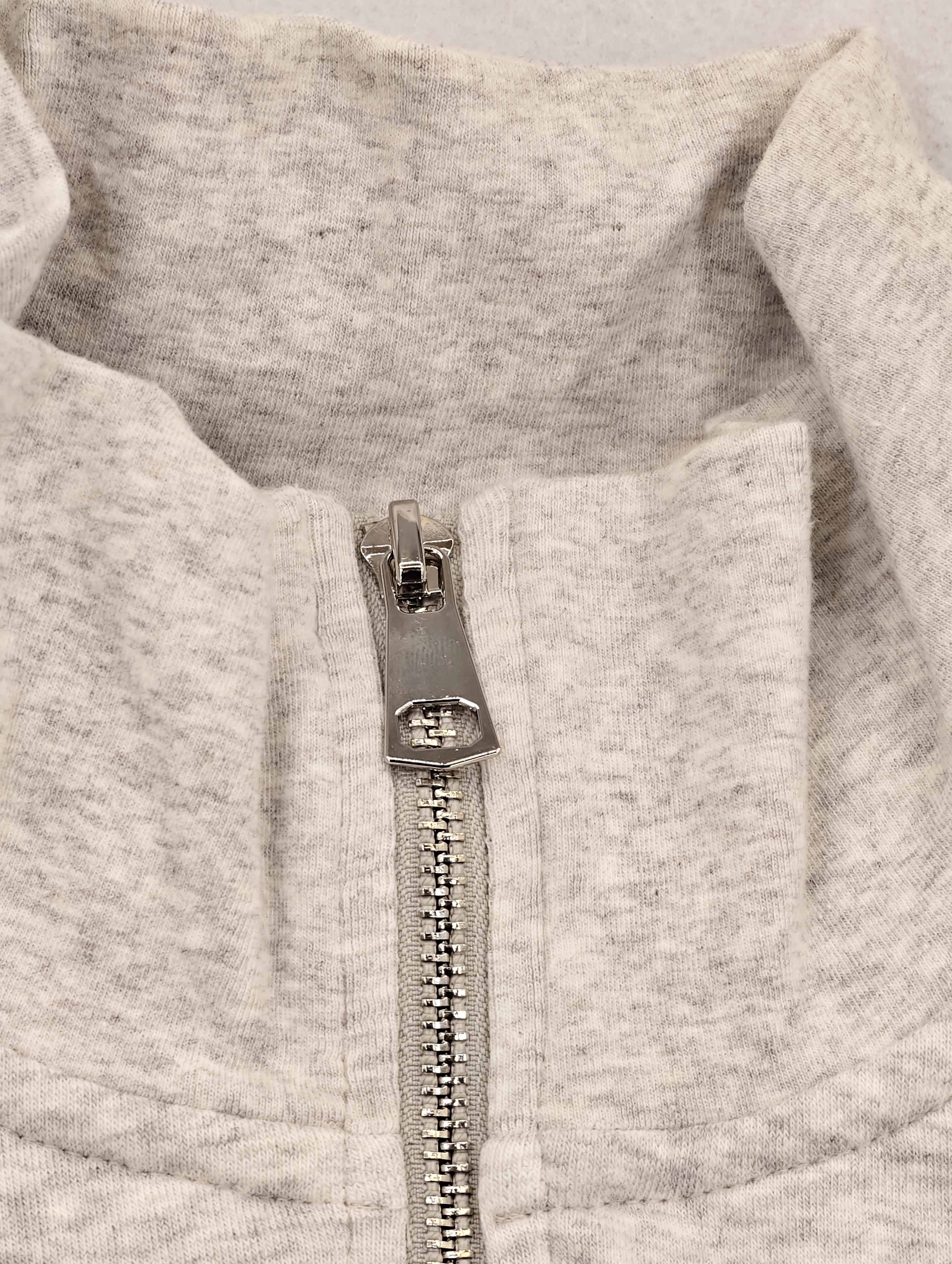 Stand collar with metal zipper on heather knit jacket