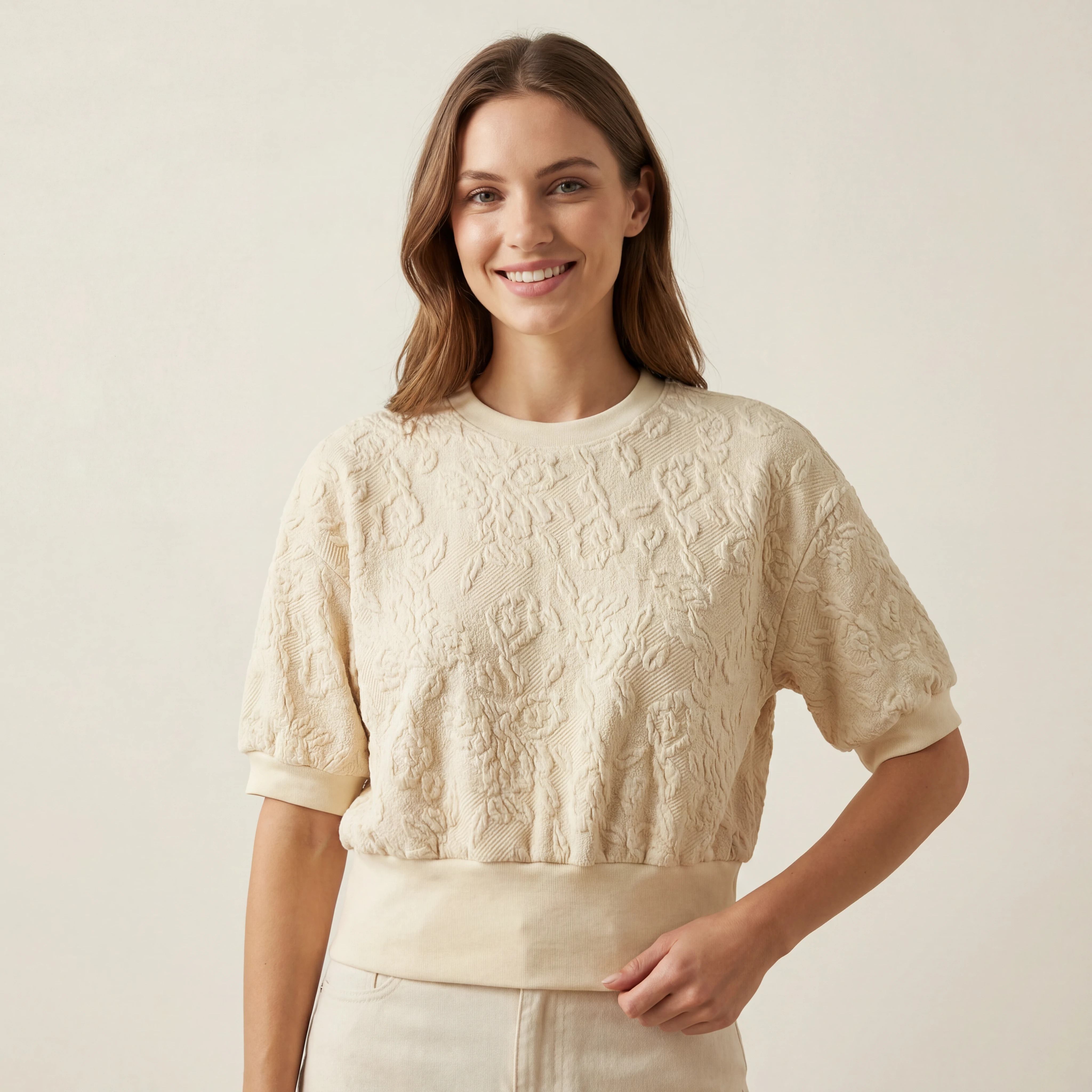 Ivory raised-texture cropped top with puff sleeves front view